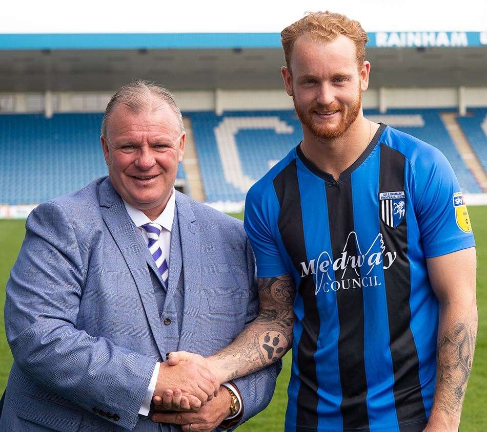 New manager Steve Evans with signing Connor Ogilvie Picture: Ady Kerry (11002304)