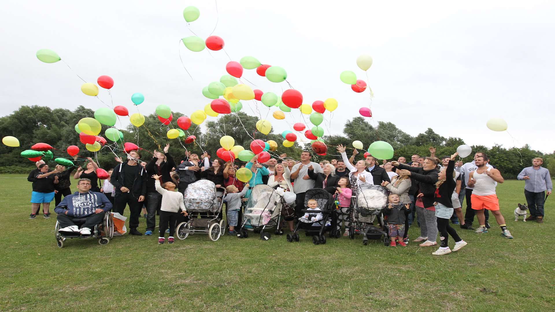 Friends and family of Mr Warman let off balloons to mark his passing