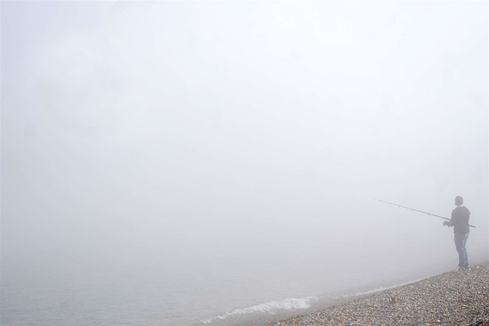 But the warmer temperatures came at a cost in some parts, with the coastline at Deal, Kent, shrouded in mist (Victoria Jones/PA)