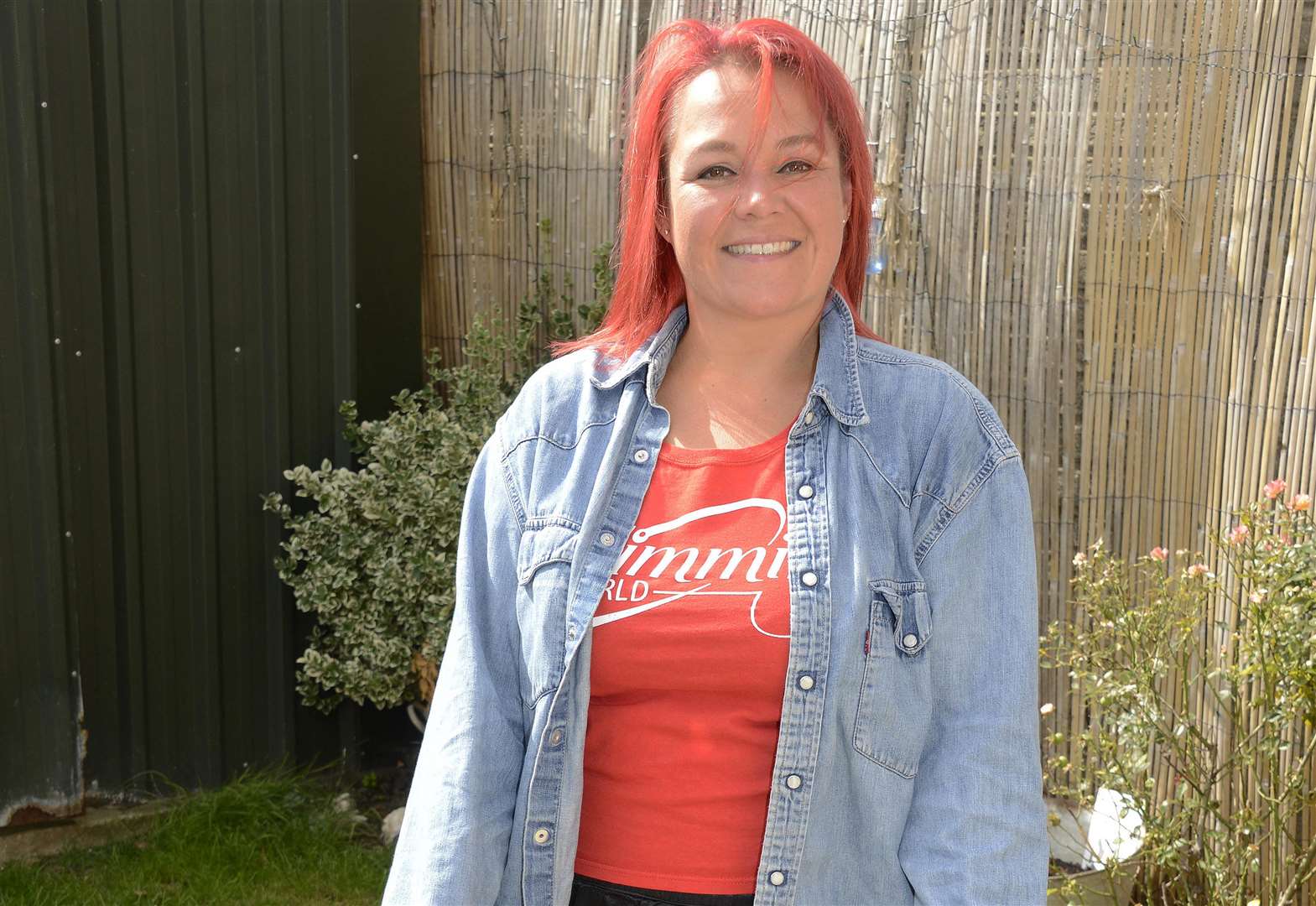 Shelley Archer in an old denim jacket she used to wear before she lost weight. Picture: Paul Amos