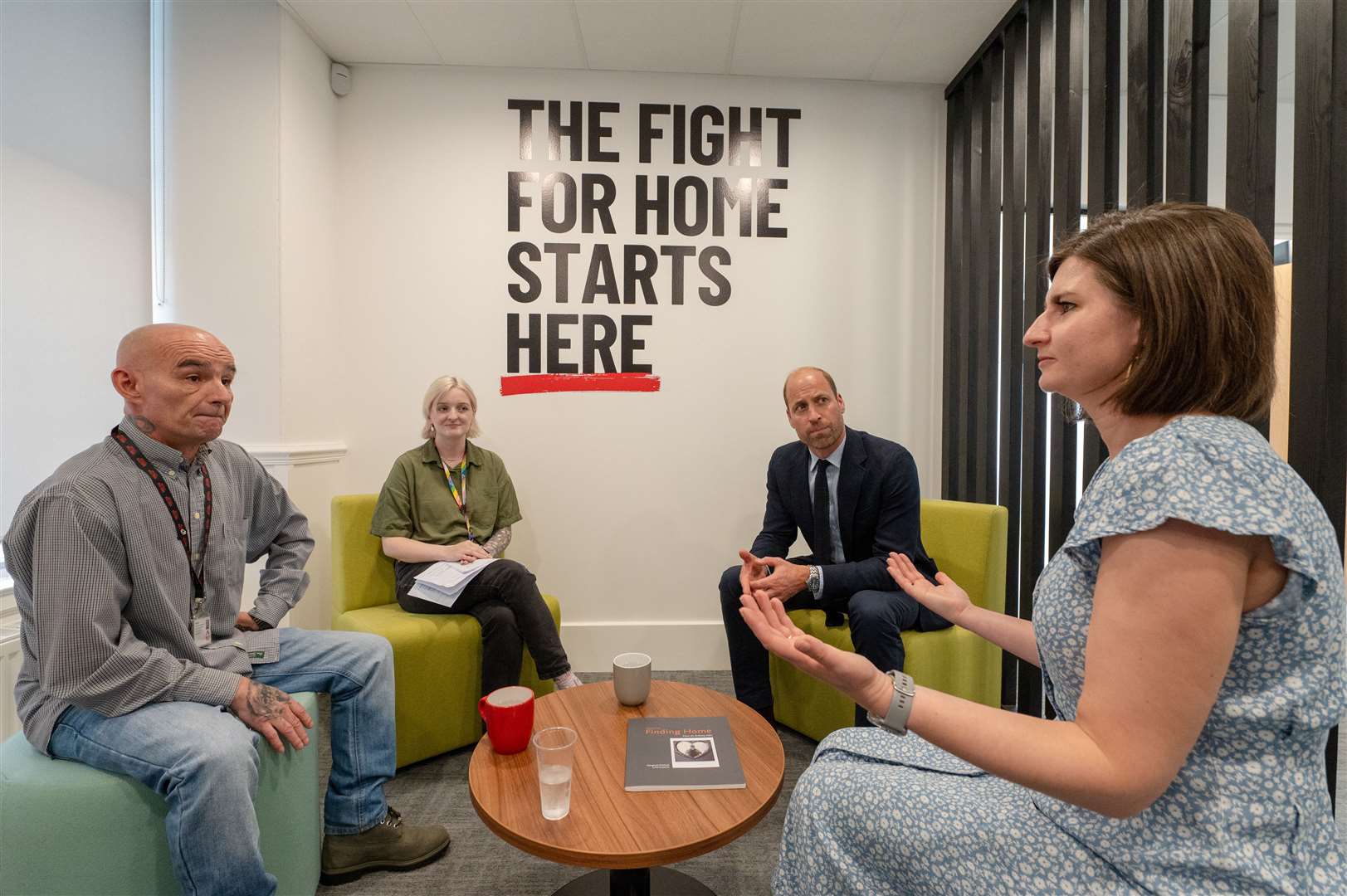 The Prince of Wales meets workers from the homelessness sector during a visit to Shelter Scotland in Aberdeen (Kenny Elrick/DC Thomson/PA)