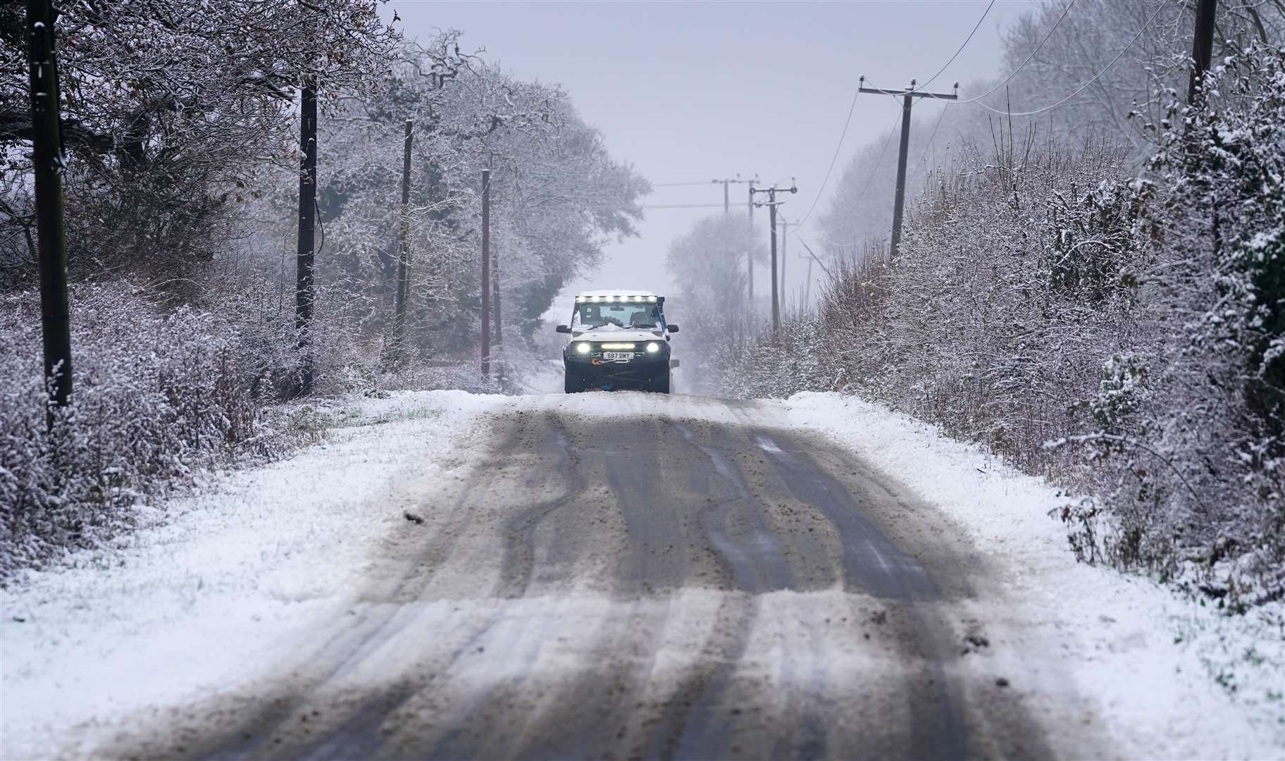 Drivers have been urged to stick to major roads that have been cleared and gritted (Gareth Fuller/PA)