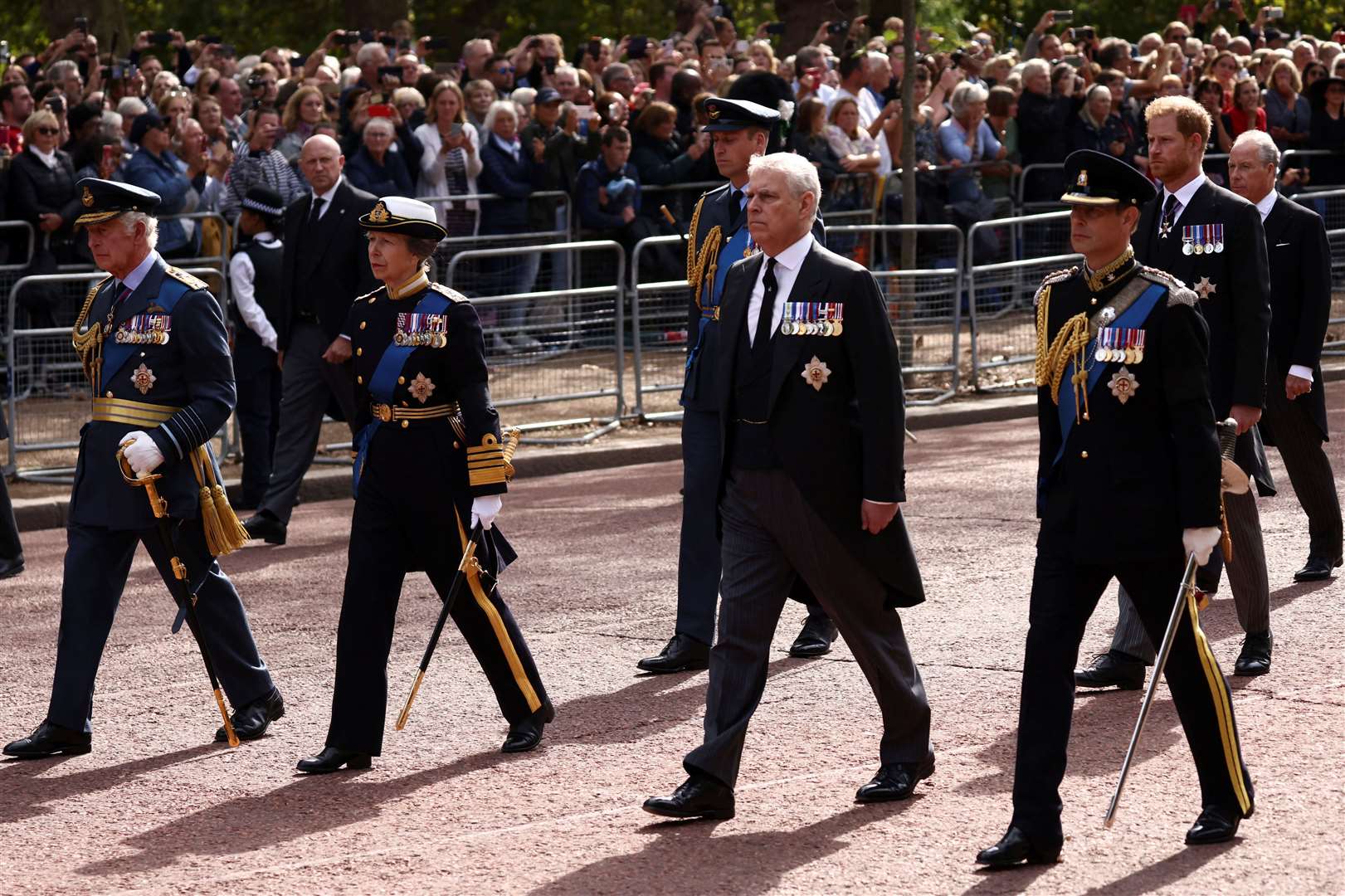 The King led his sons and other members of the royal family in the solemn procession (Henry Nicholls/PA)