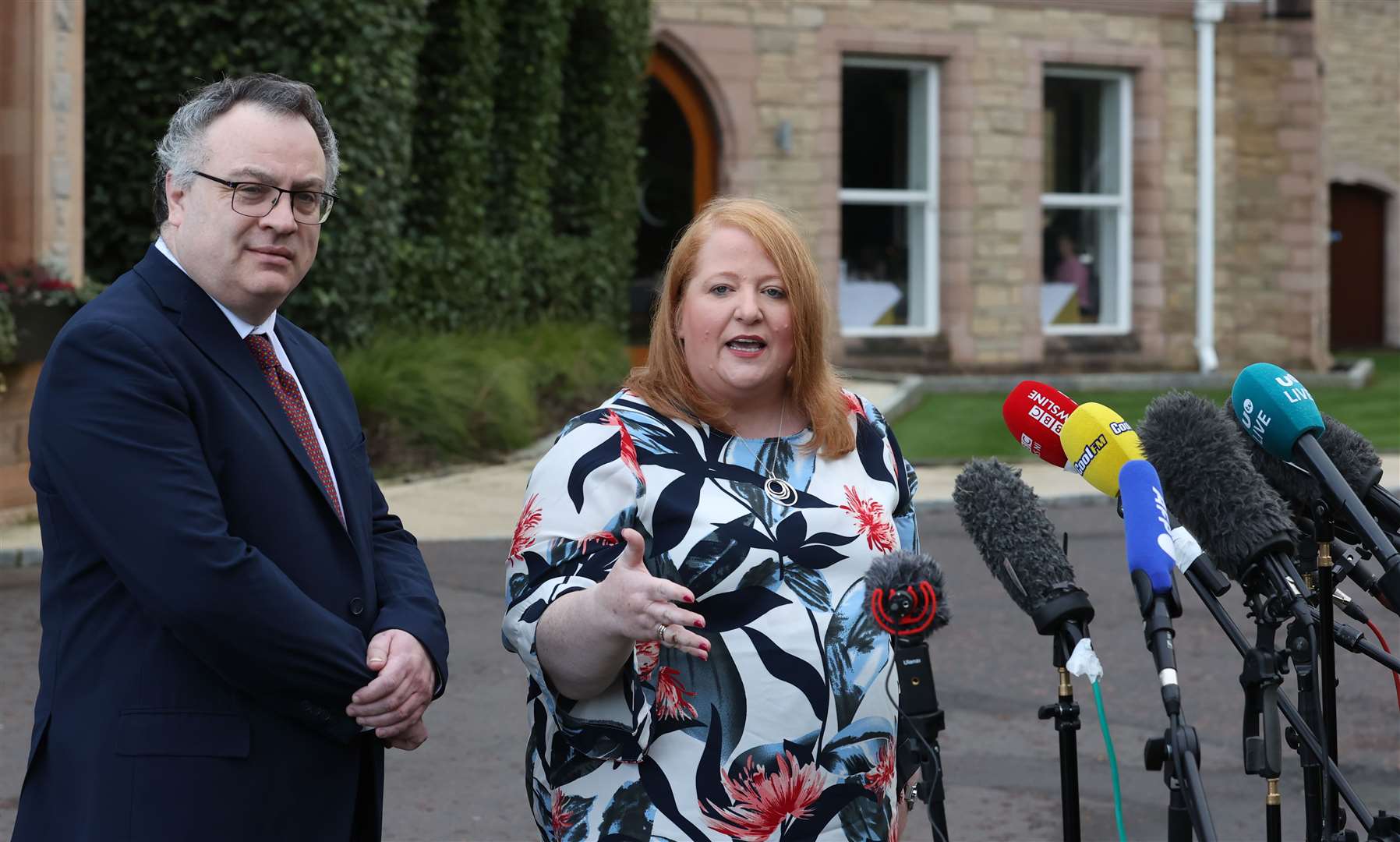 Alliance Party leader Naomi Long and party colleague Stephen Farry (Liam McBurney/PA)