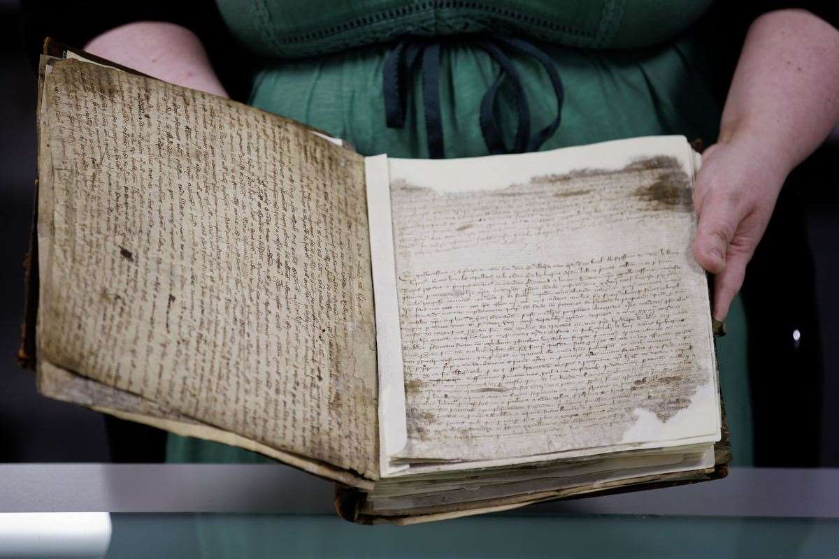 One of the ecclesiastical registers being worked on at the Public Records Office of Northern Ireland (Liam McBurney/PA)