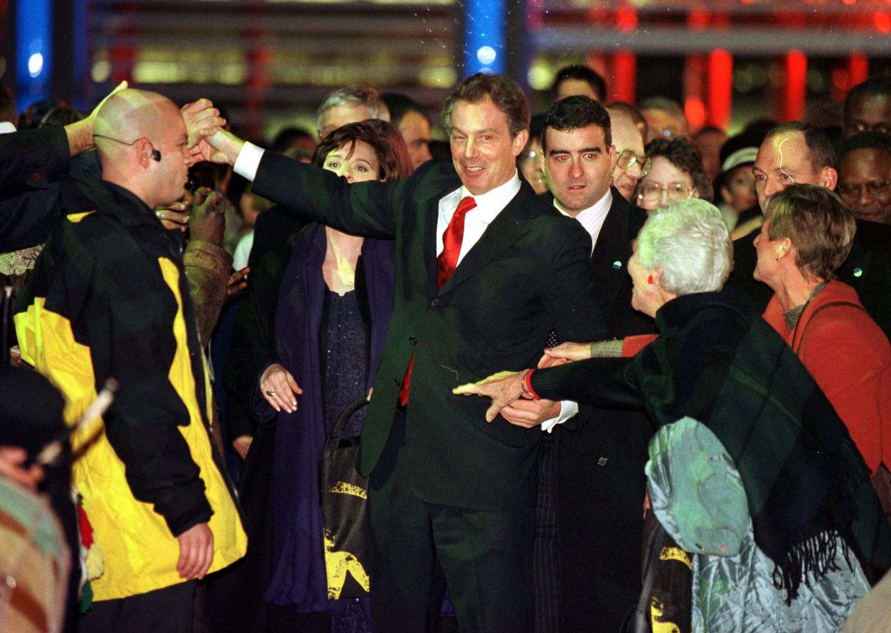 Tony Blair accompanied by his wife Cherie arrive at the Millennium Dome in Greenwich in London, for the New Year’s Eve opening of the Dome (PA Archive)