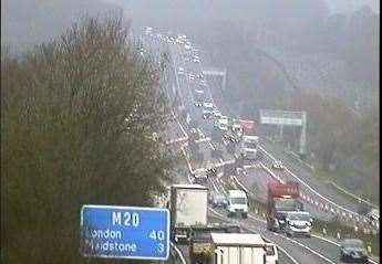 A crash between a lorry and a car has blocked part of a motorway (8241975)