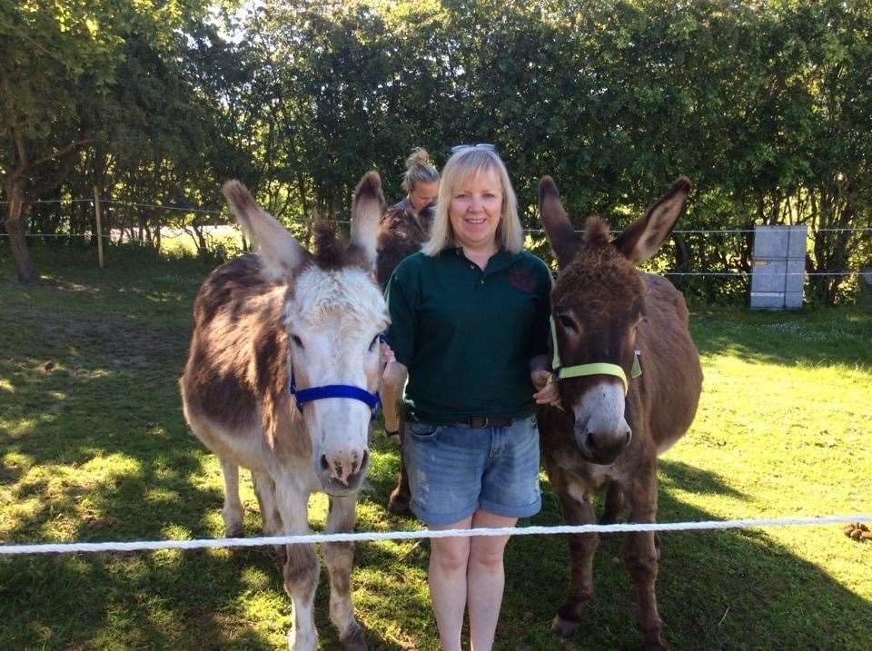 Sandra Curran at the sanctuary (Donegal Donkey Sanctuary/PA)