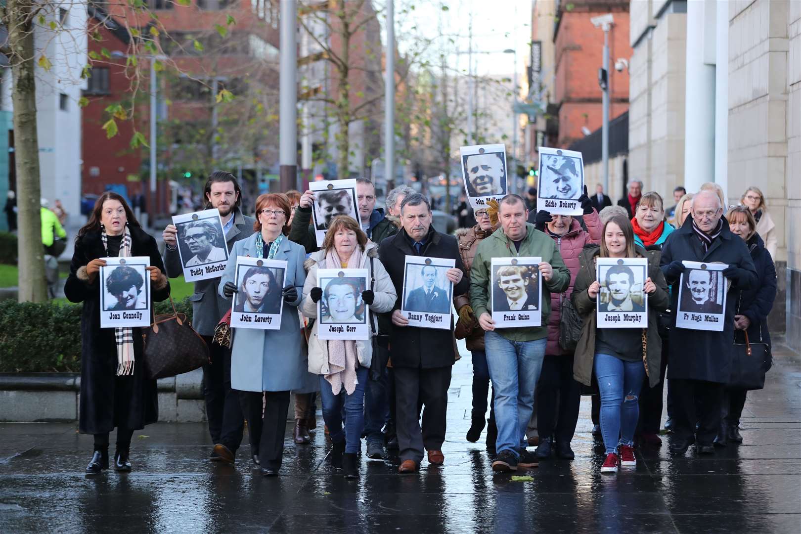 Bereaved family members outside Belfast Coroner’s Court (Niall Carson/PA)