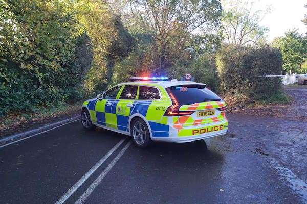 A police car at the scene on Stock Road in Essex (Essex Police/PA)