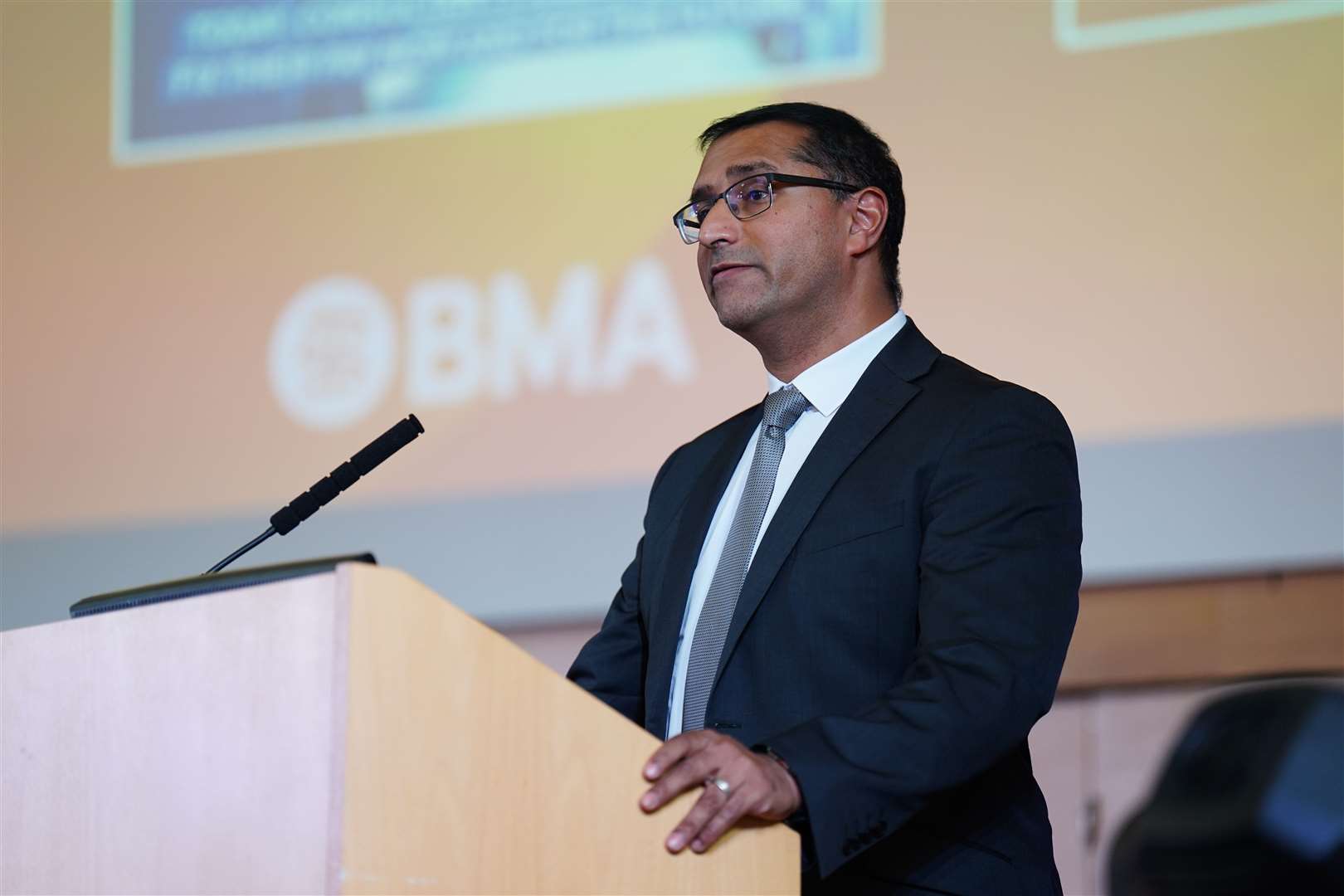 Dr Vishal Sharma speaks during a rally of consultant members of the British Medical Association at the BMA headquarters in London (James Manning/PA)