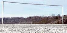 Snow covered football pitch