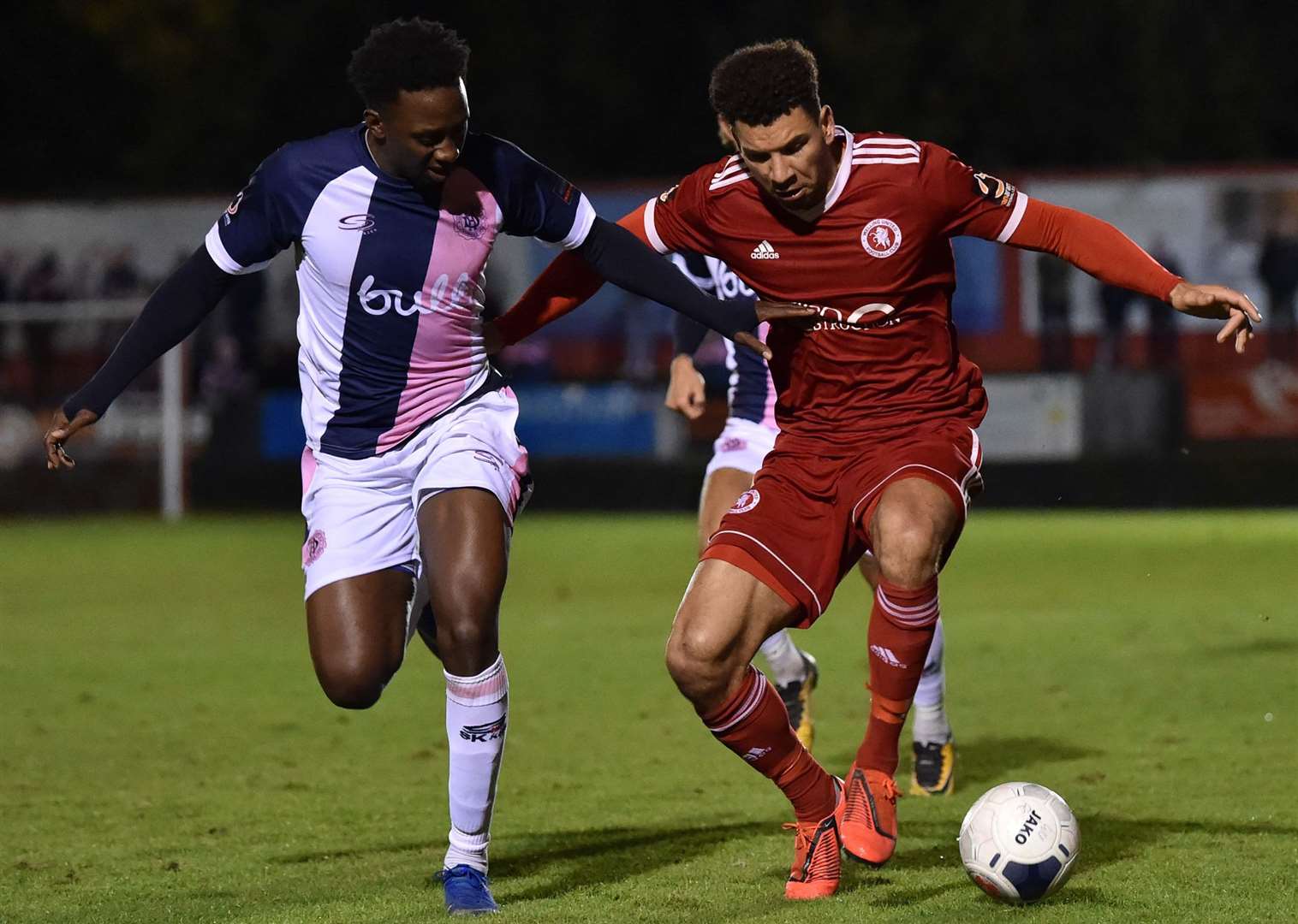 Welling's Nathan Green is closed down by Dulwich's Marvin McCoy. Picture: Keith Gillard