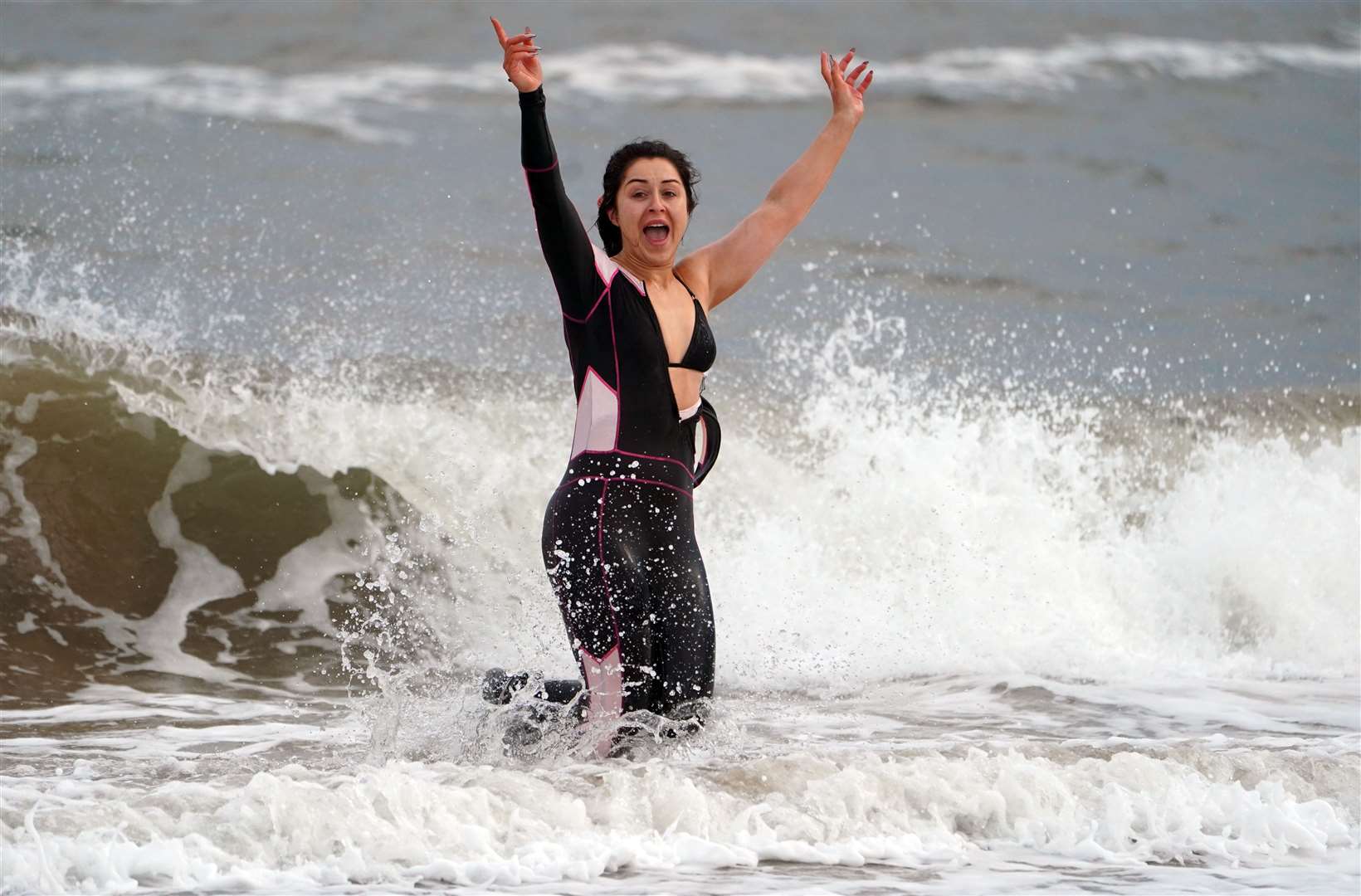 Rachel Tampin, 28, from Wallsend, takes a dip into the sea at Whitley Bay in Northumberland (Owen Humphreys/PA)