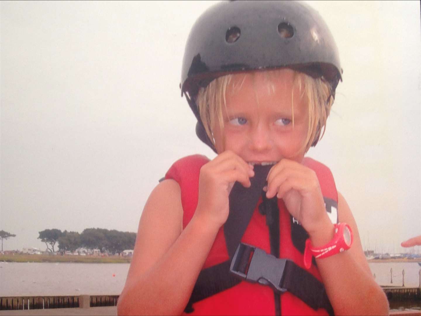 Emma Wilson age five on the water in a Topper dinghy (Penny Wilson/PA)