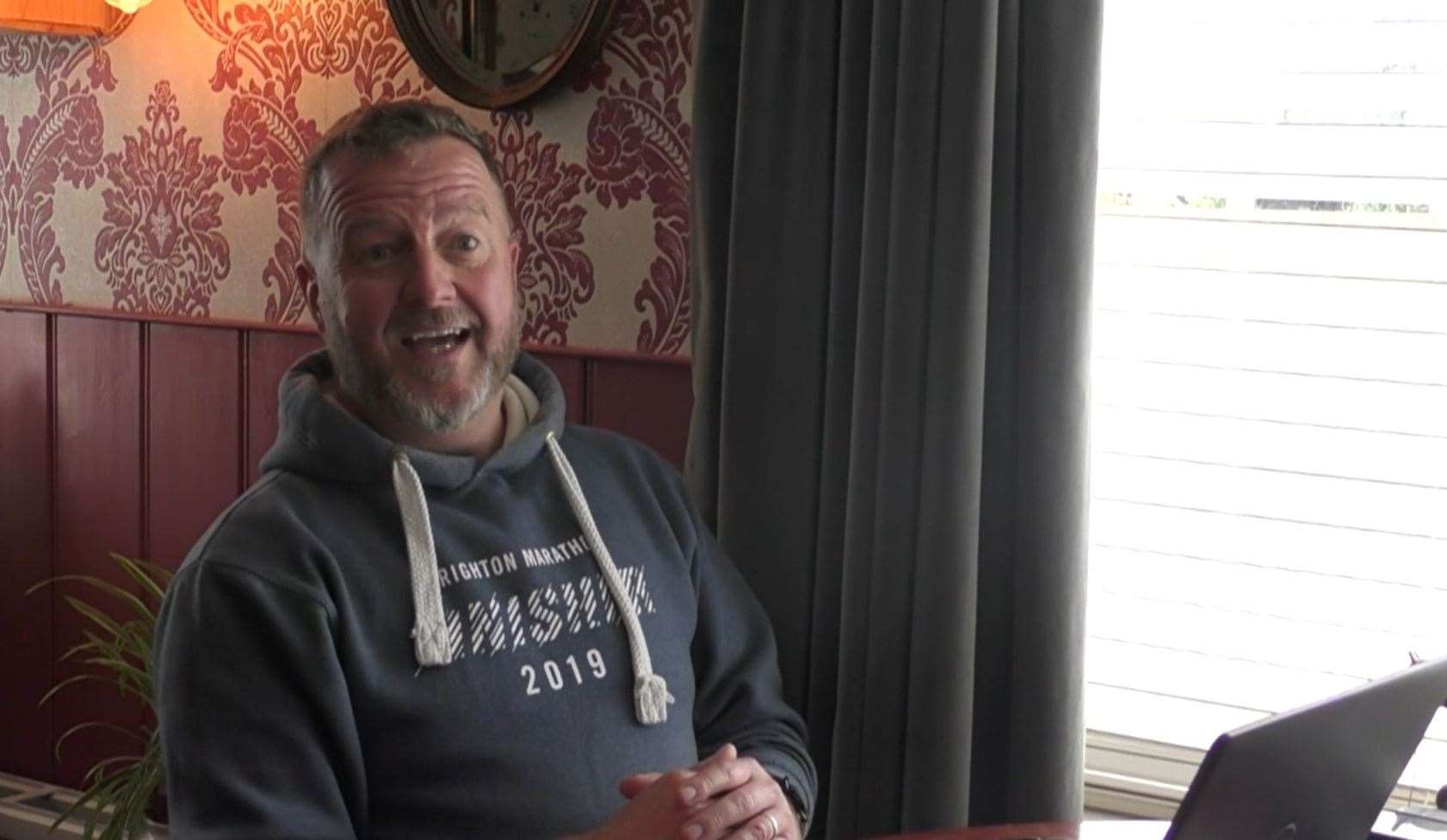 Businessman Jonathan Buckett at work at his pub desk at the Red Lion, Badlesmere