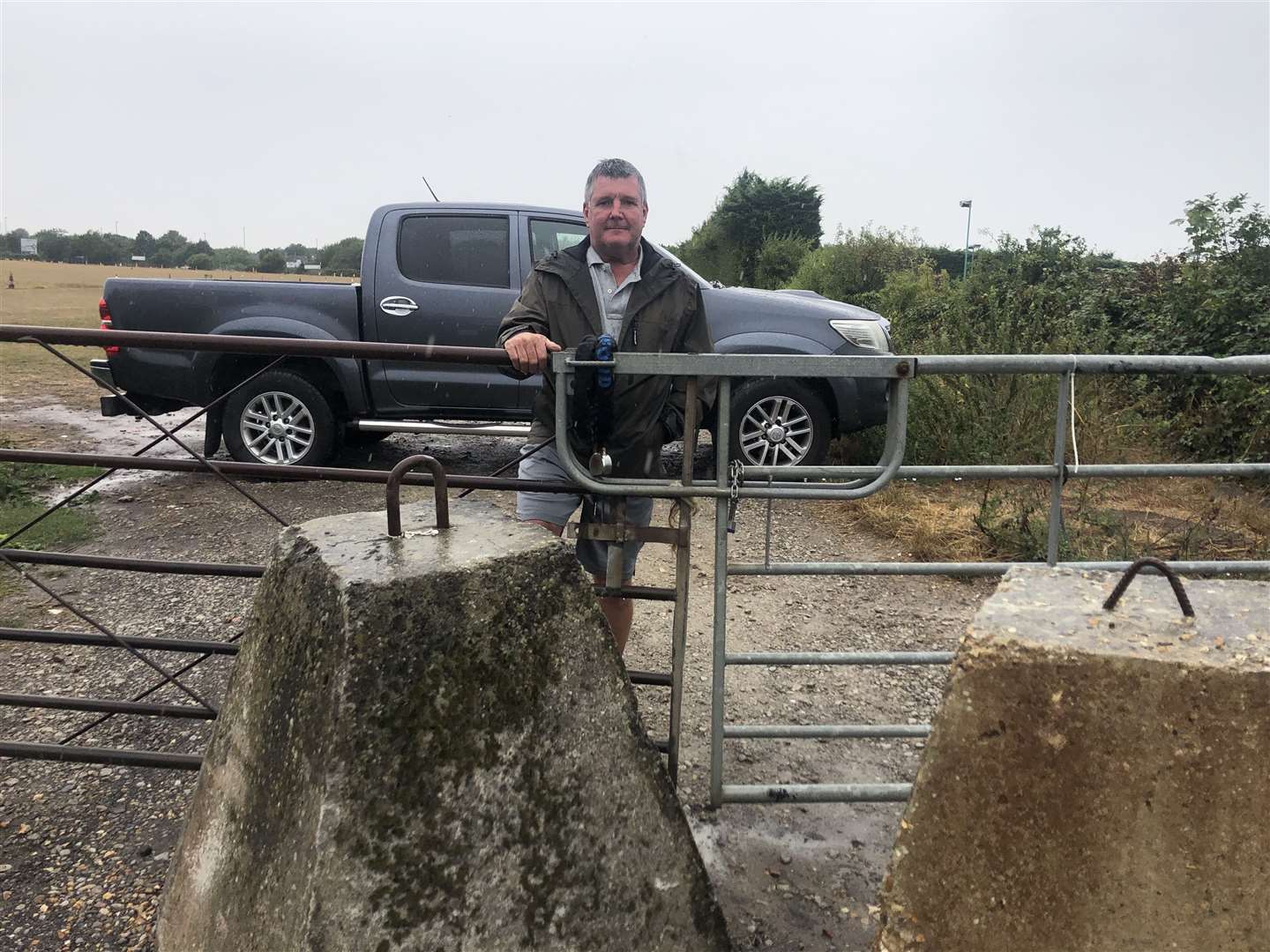 Mark Greenfield has installed military-like defences to stop travellers getting onto his field