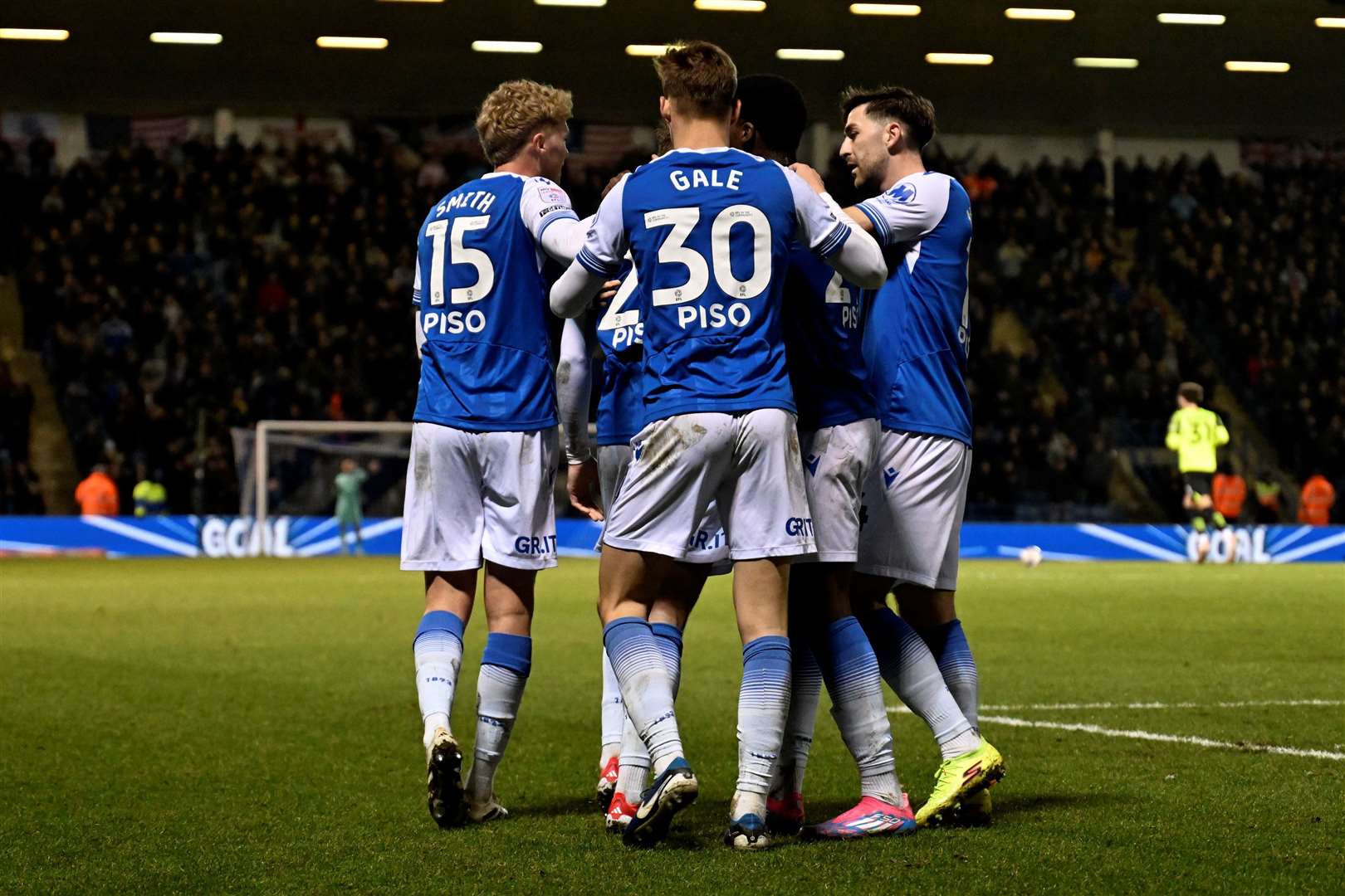 Elliott Nevitt celebrates with fellow Gills players after scoring the opening goal.Gillingham (blue) versus Fleetwood.League Two.Gillingham FC, Priestfield stadium, Gillingham.Picture: Barry Goodwin