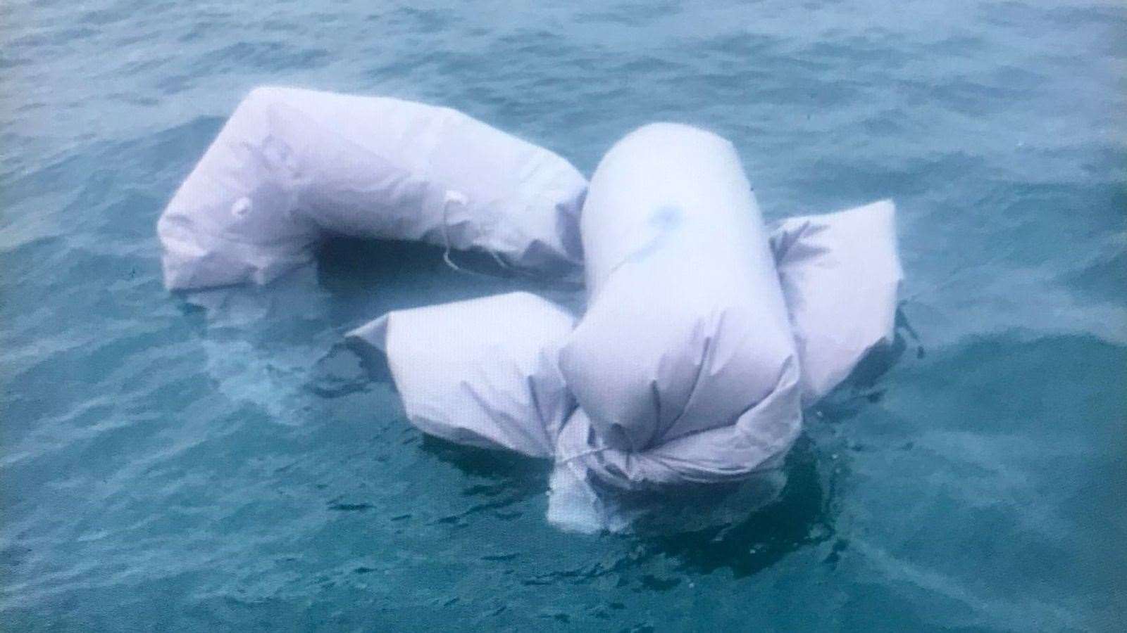 The sunk dinghy off Calais Picture: Local lifeboat crew