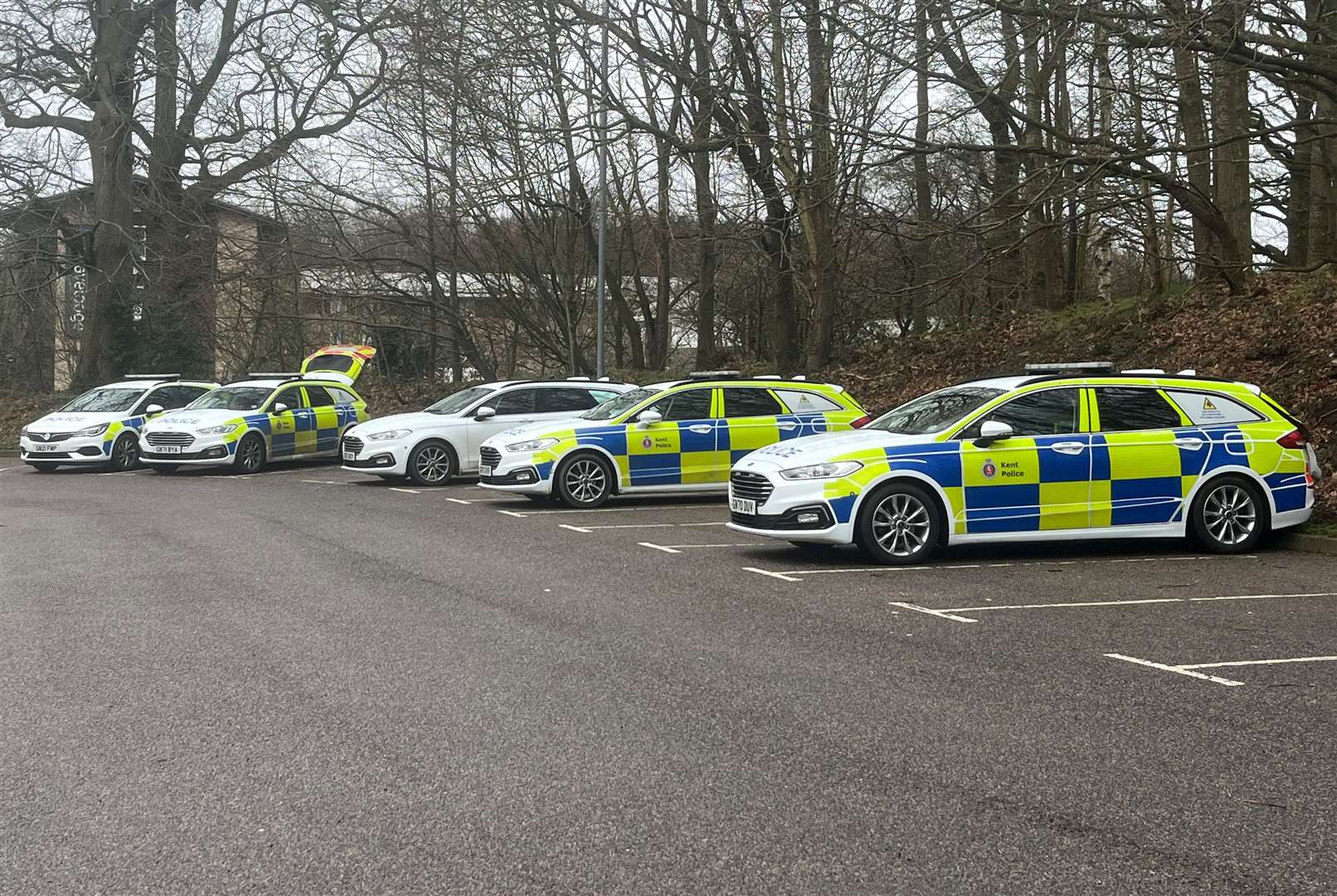 Dog units parked in the overflow car park of Eureka Leisure Park in Ashford