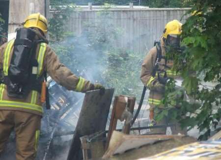 Firefighters at the scene. Picture courtesy PAUL KEMP