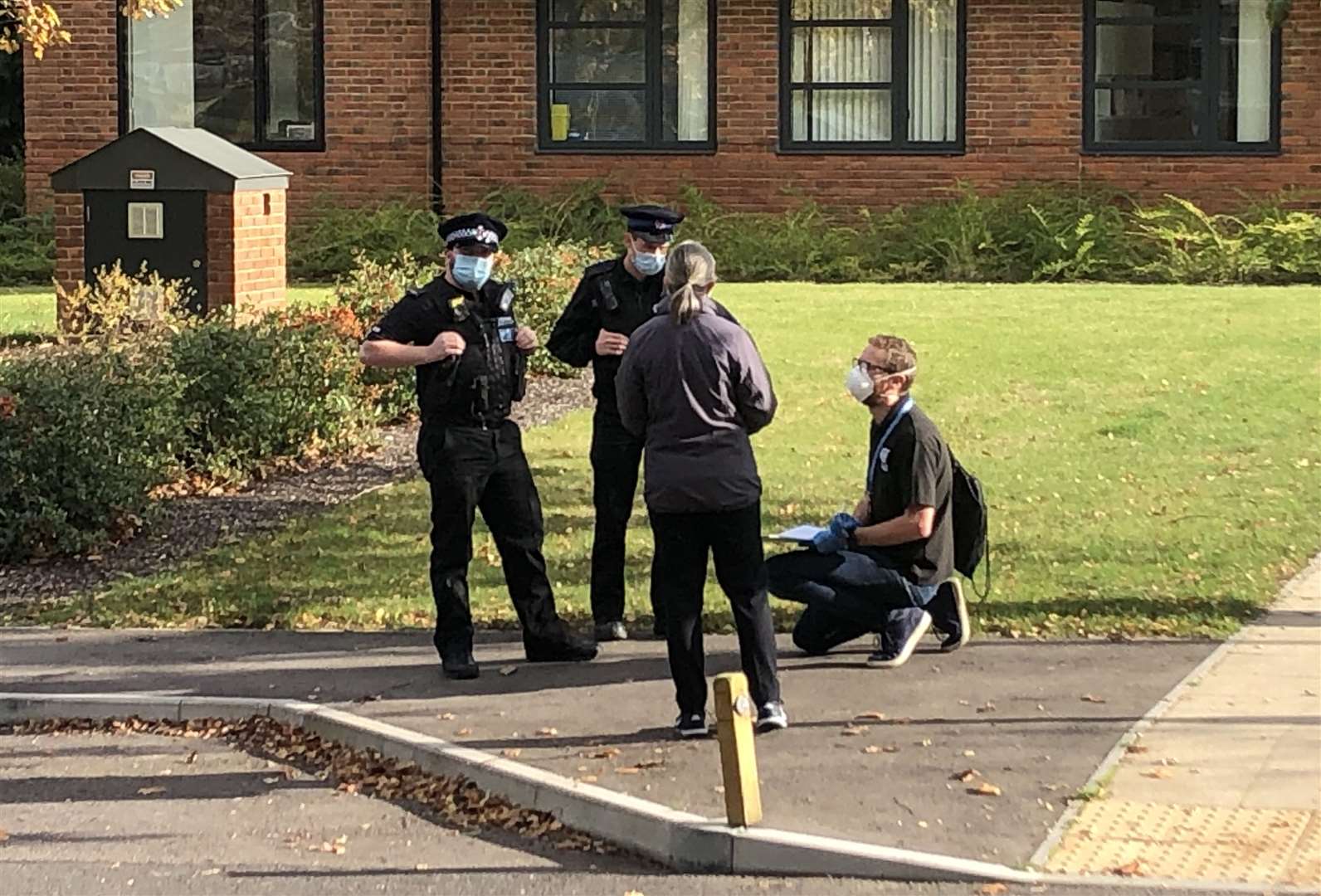 KCC officers and Kent Police arriving at the barbers yesterday