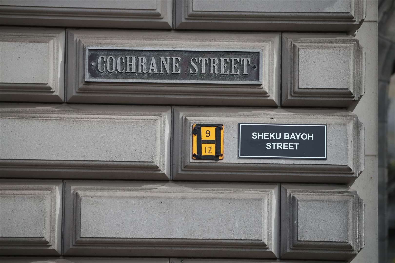 A sign alternatively naming Cochrane Street ‘Sheku Bayoh Street’ in Glasgow. (PA)