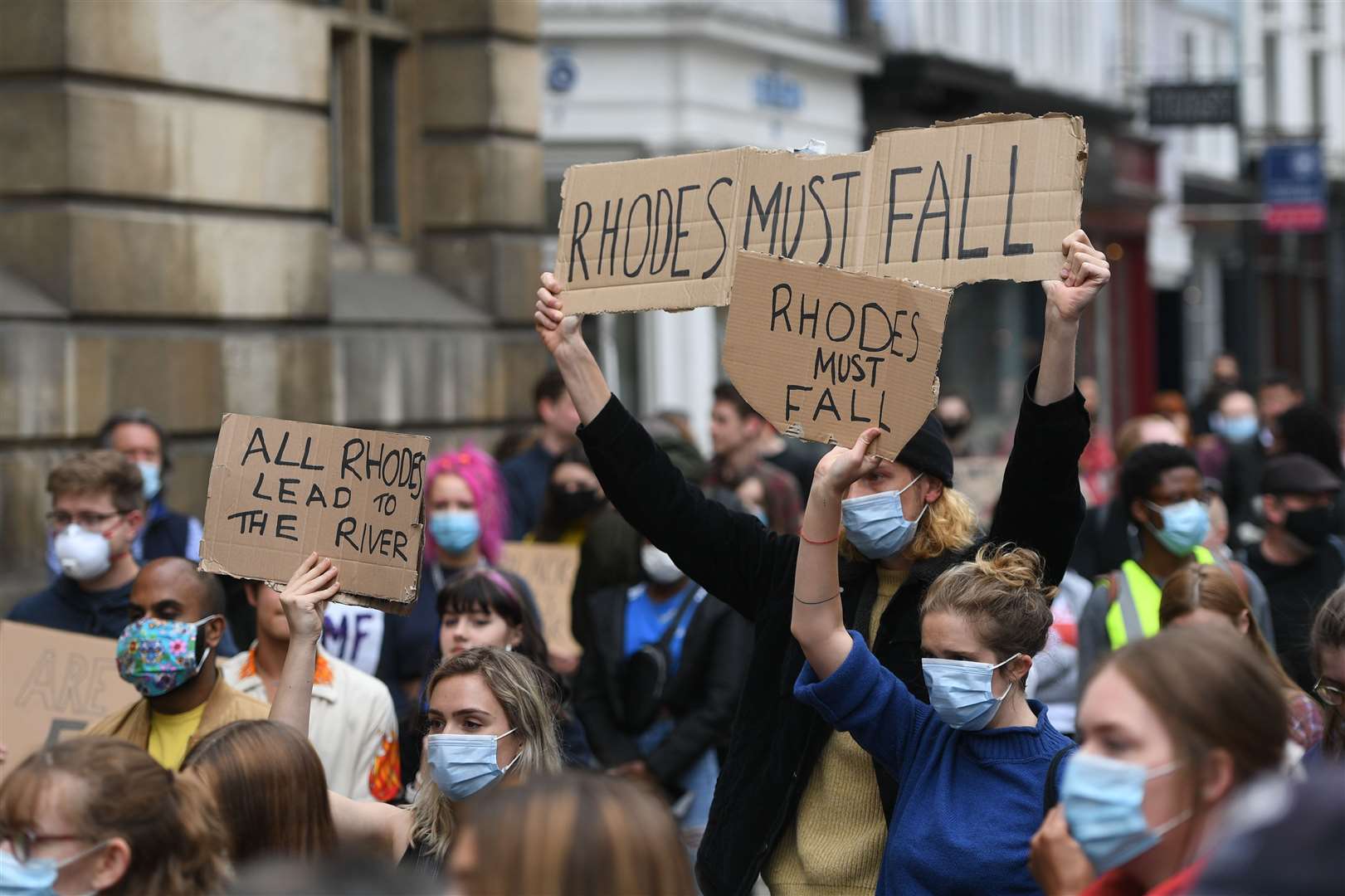 Protesters calling for the removal of the statue of 19th century imperialist Cecil Rhodes from the Oriel college (Joe Giddens/PA)