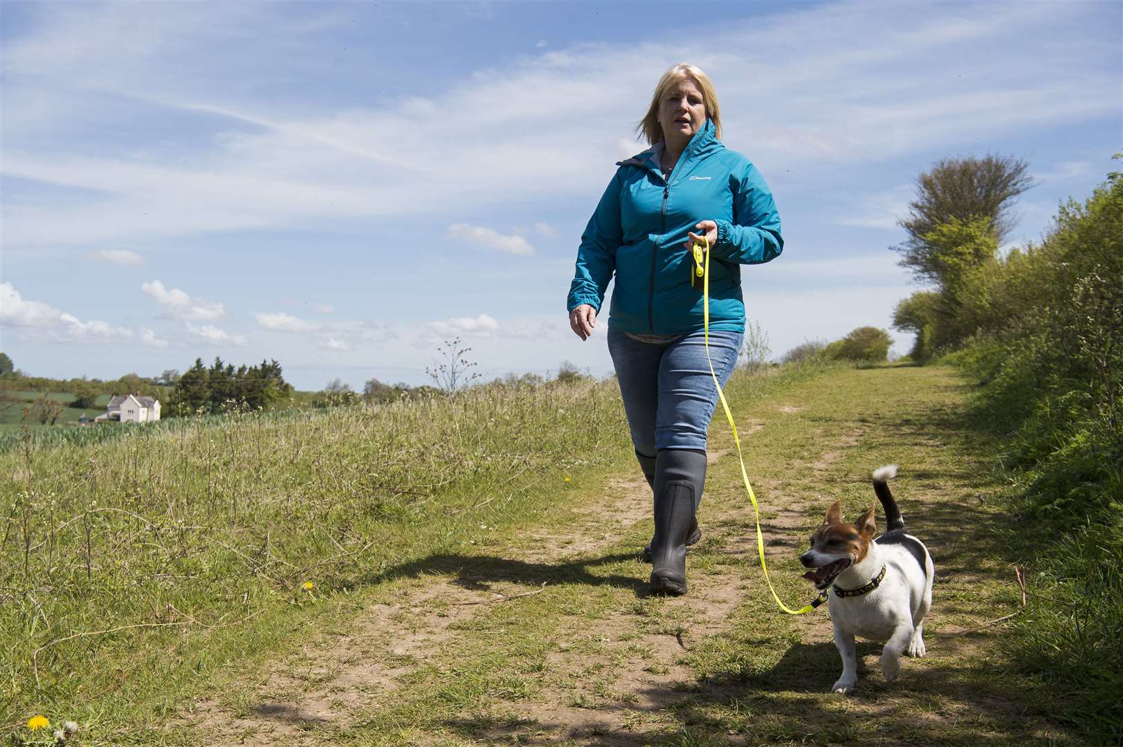 An actress playing the role of Julia James walks the PCSO’s Jack Russell dog Toby (Kirsty O’Connor/PA)