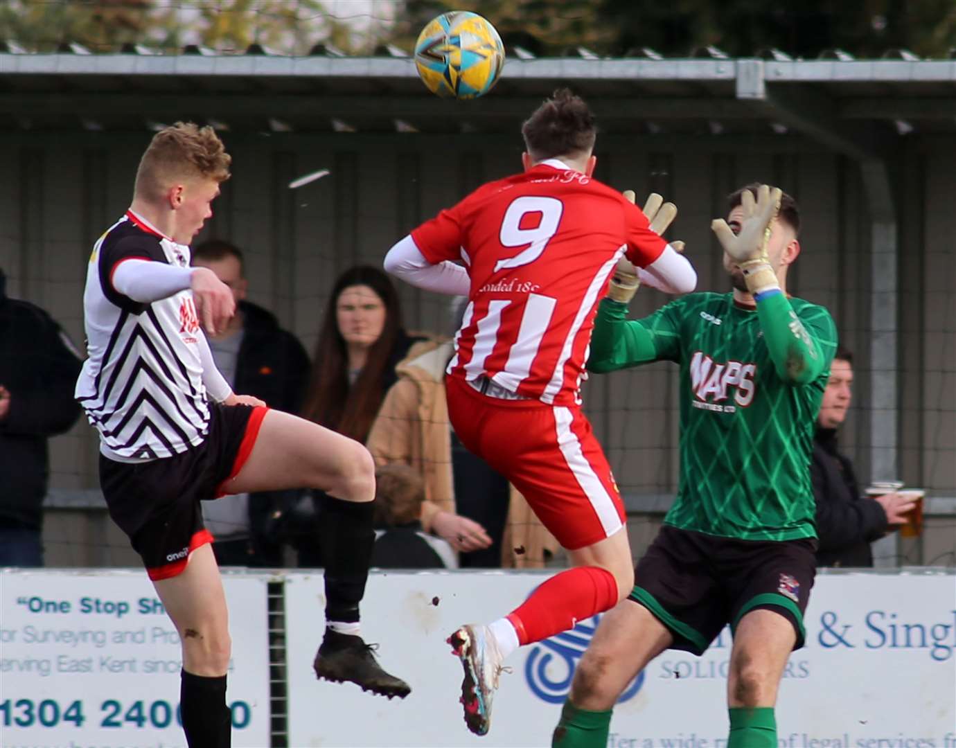 Louie Clarke of Rusthall is denied by Deal keeper Henry Newcombe as Alex Green challenges. Picture: Paul Willmott