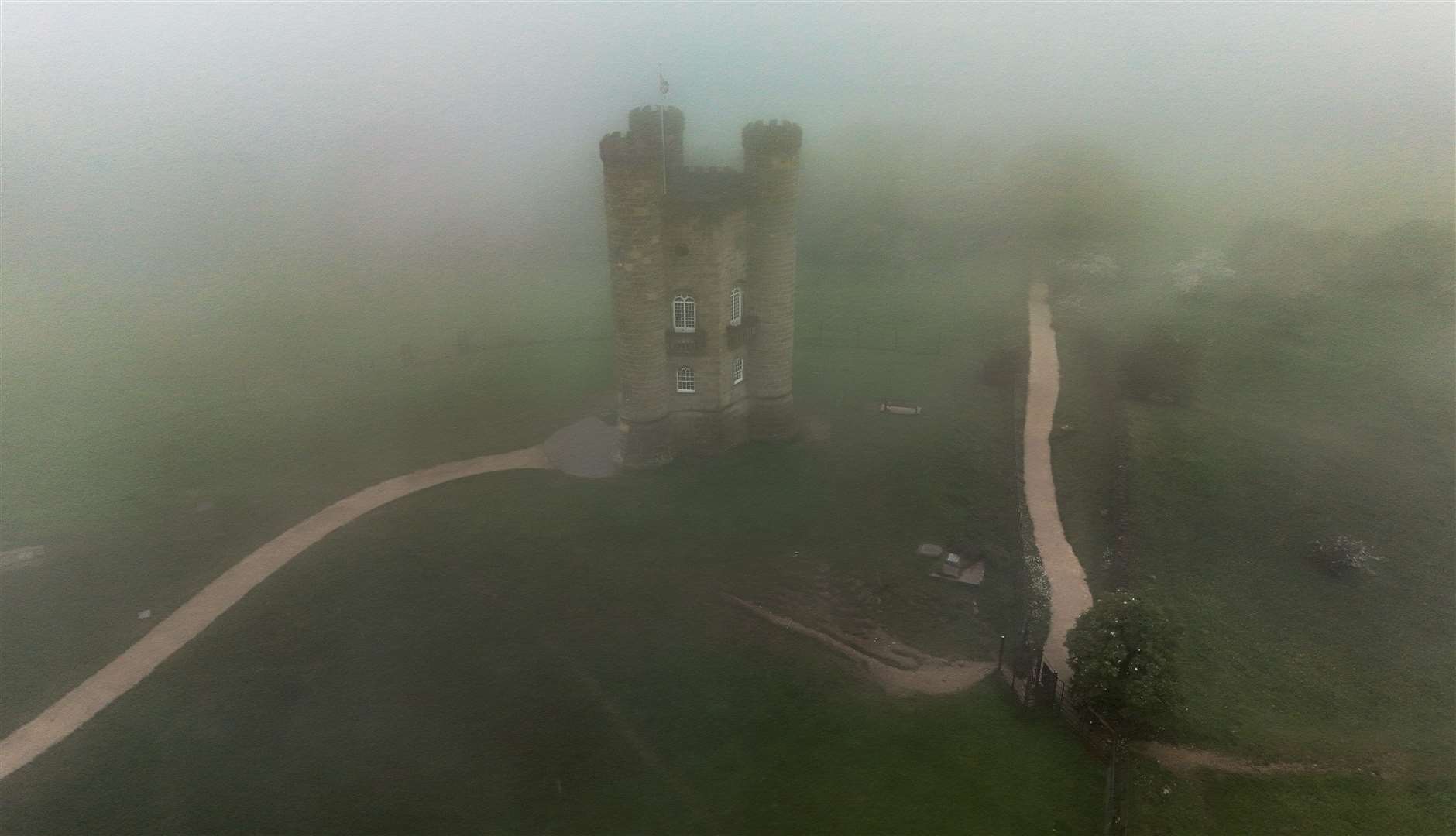 Broadway Tower in the Cotswolds, shrouded in mist on a cloudy day in May (David Davies/PA)