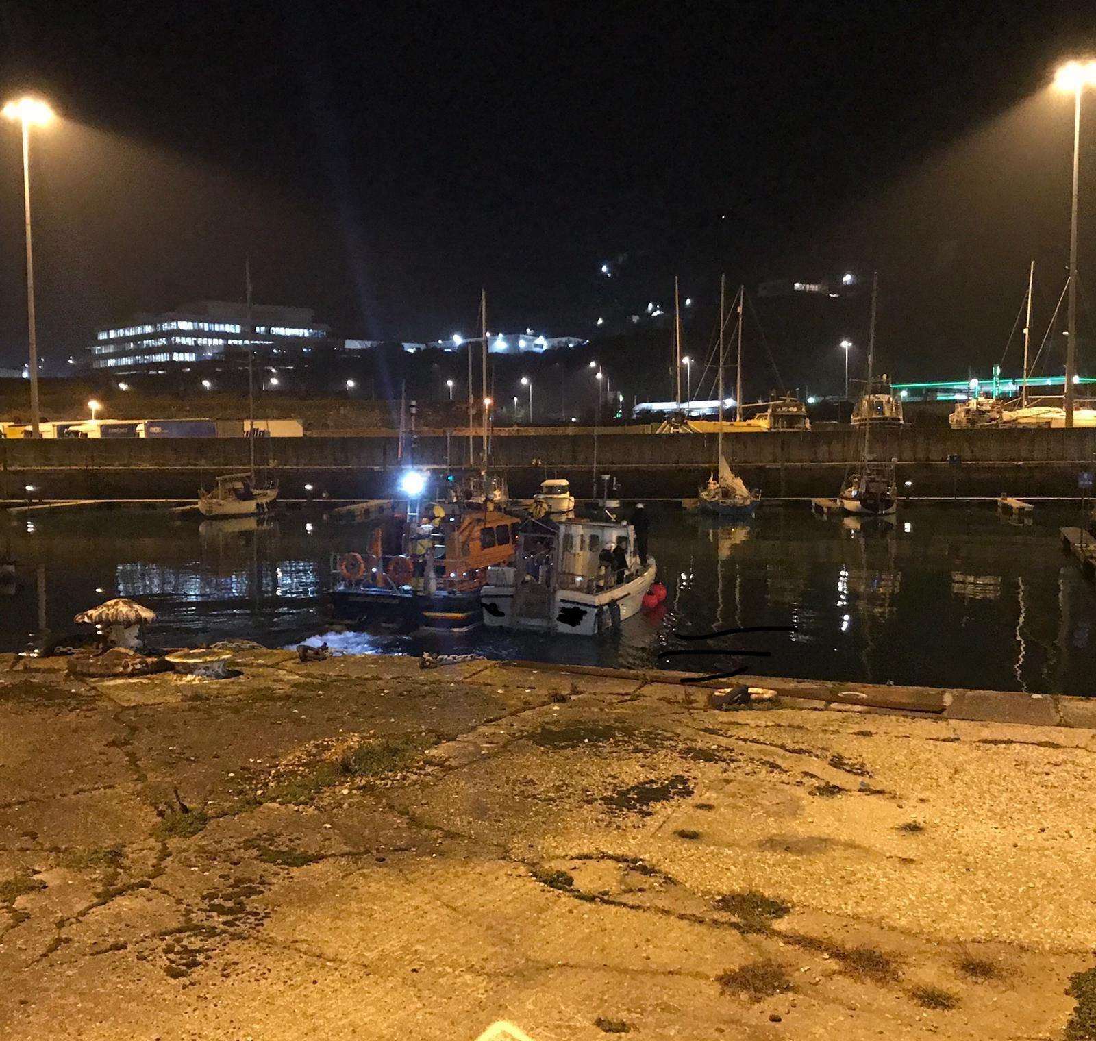 Dungeness RNLI lifeboat safely mooring the casualty in Dover Harbour. Credit: RNLI/Ant Hills (7491593)