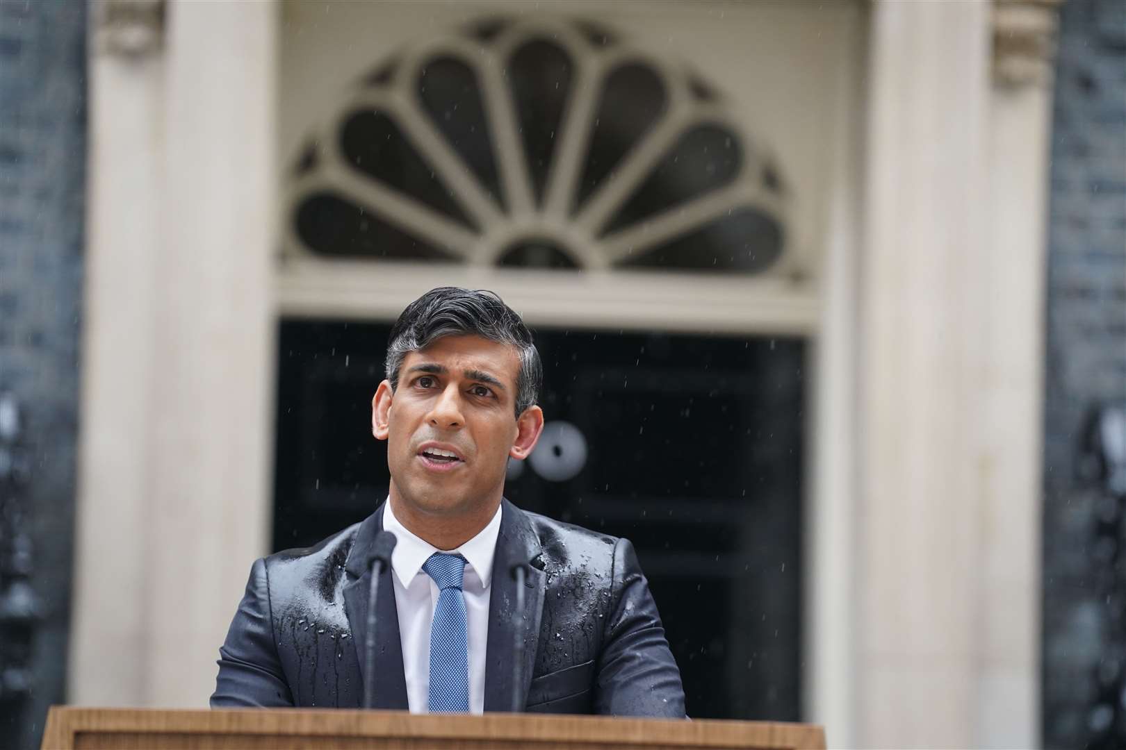 Prime Minister Rishi Sunak issues his election statement outside 10 Downing Street (Stefan Rousseau/PA)