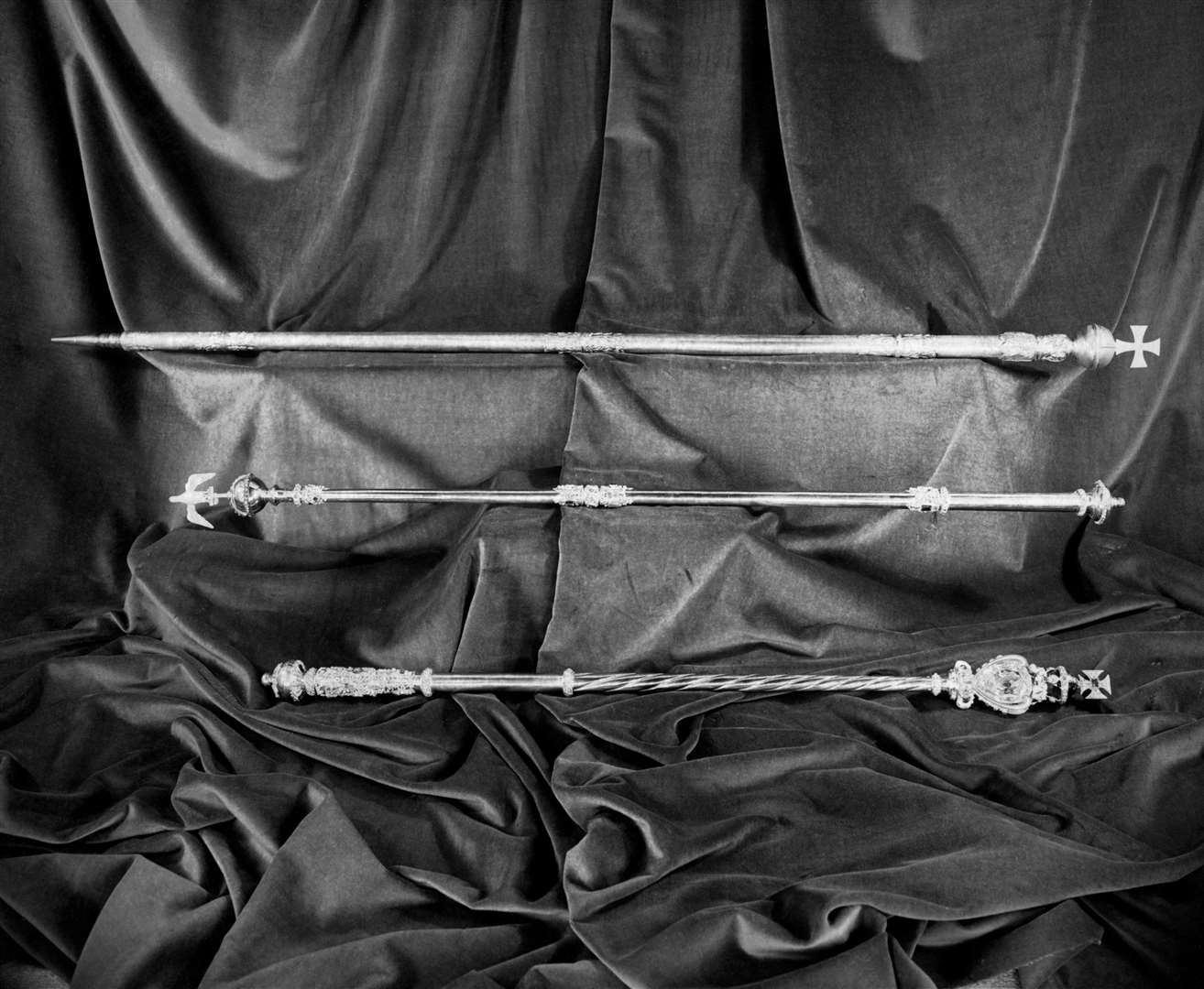 St Edward’s Staff (top) with its steel pike, the Sceptre with Dove and the Sceptre with Cross (Crown Copyright/PA)