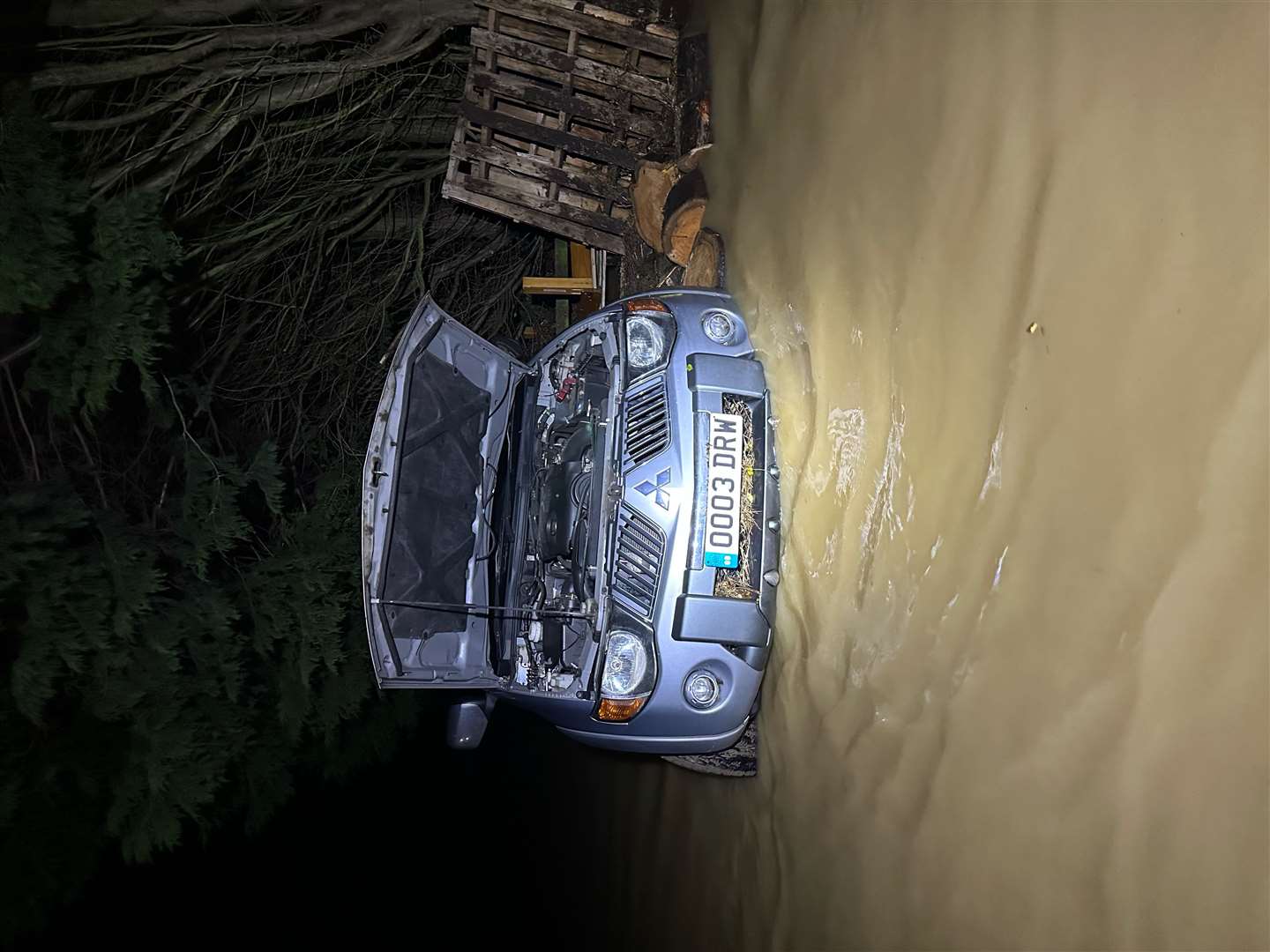 Mr Walters’ partially submerged vehicle (David Walters/PA)