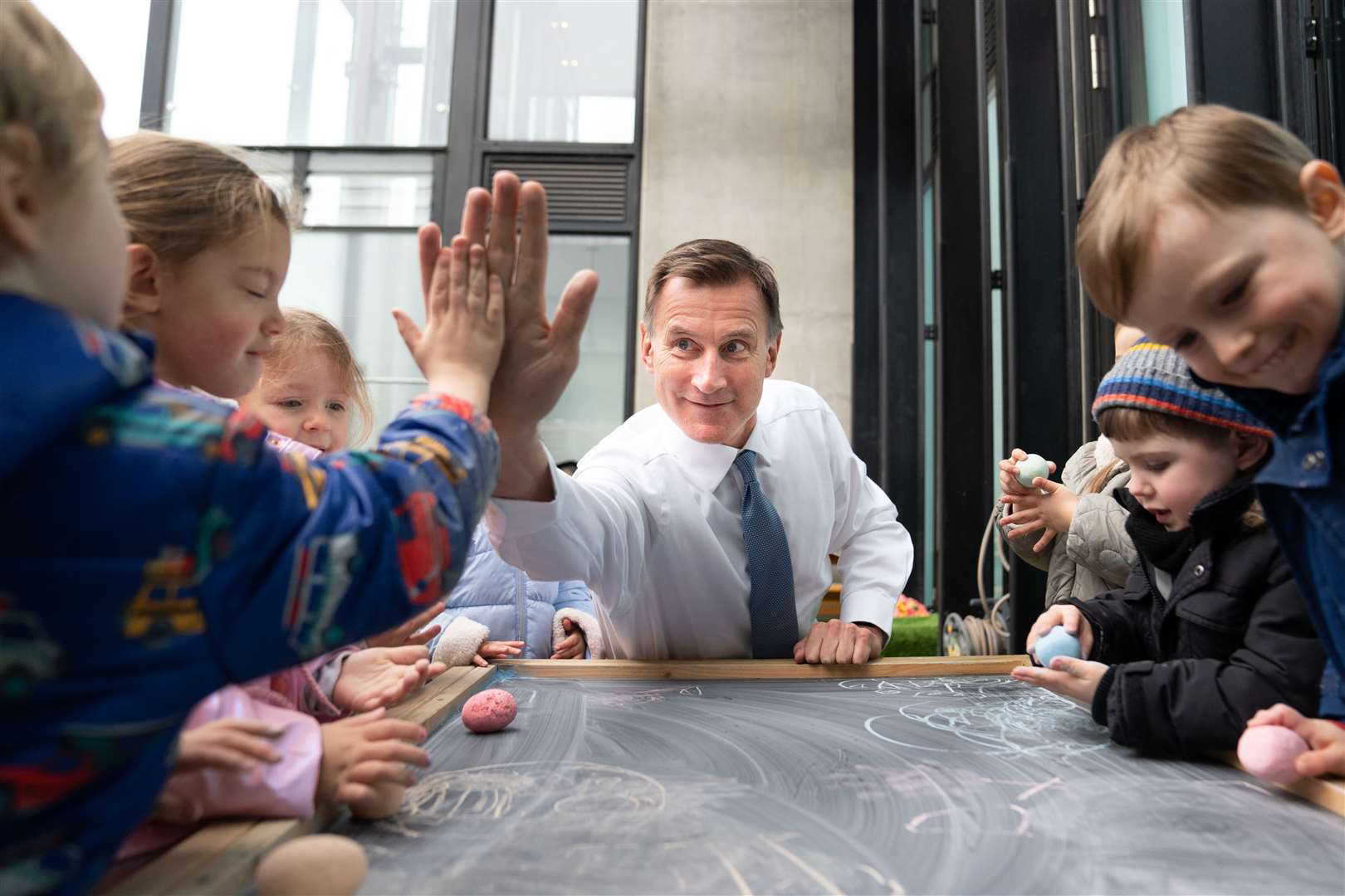 Chancellor Jeremy Hunt said the OECD praised his flagship childcare scheme (Stefan Rousseau/PA)