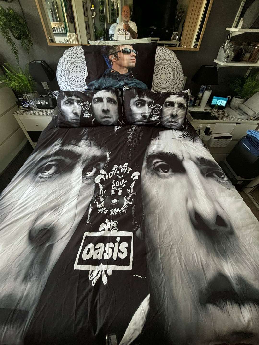 Oasis superfan John Smallbones owns several duvet covers featuring Noel and Liam Gallagher’s faces (John Smallbones)