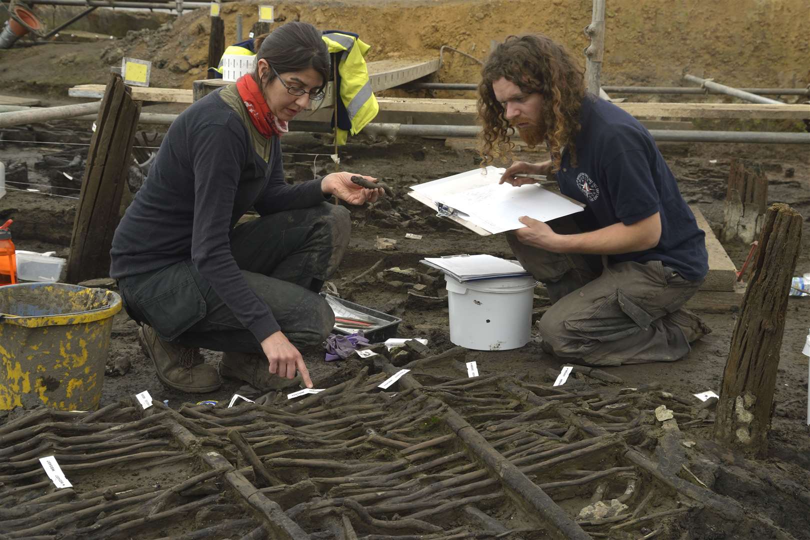 Researchers at the Must Farm Quarry excavation site (Cambridge Archaeological Unit/PA)