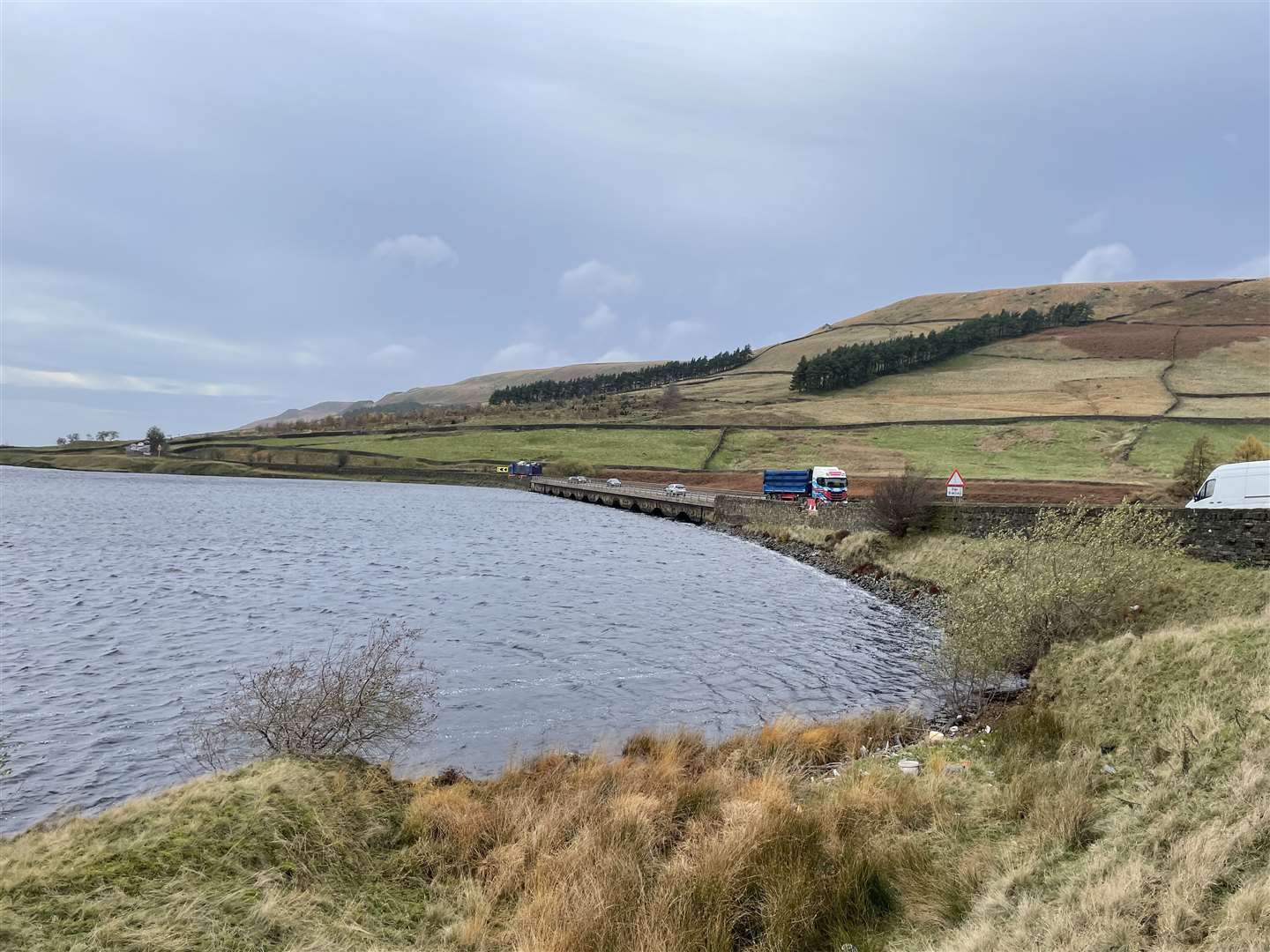 Woodhead Reservoir in August (top) and November (Dave Higgens/PA)