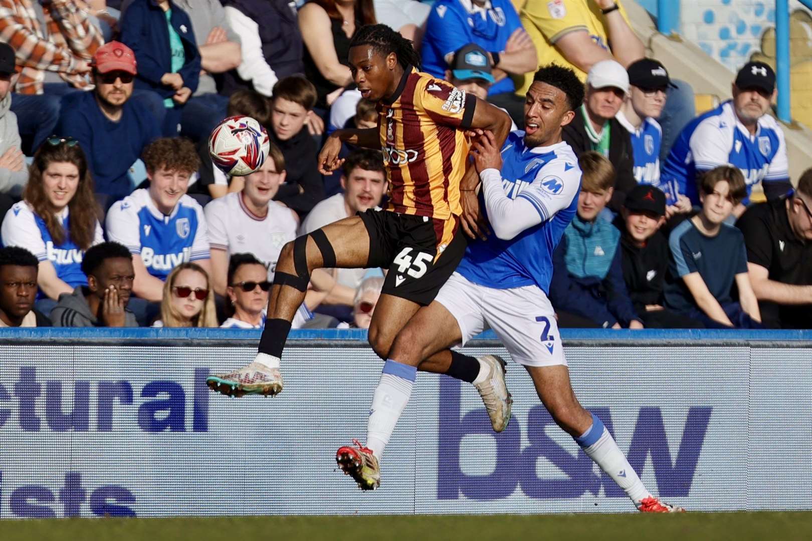 Remeao Hutton challenges Tayo Adamarola in Gillingham’s win over Bradford City Picture: @Julian_KPI