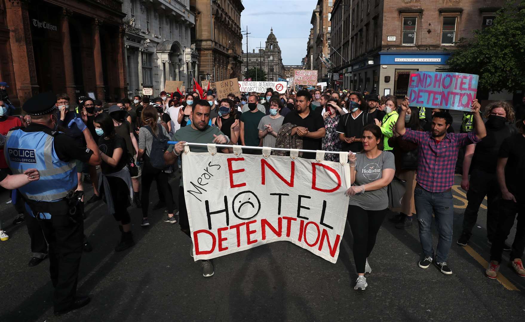 Demonstrators were escorted from the scene by police (Andrew Milligan/PA)