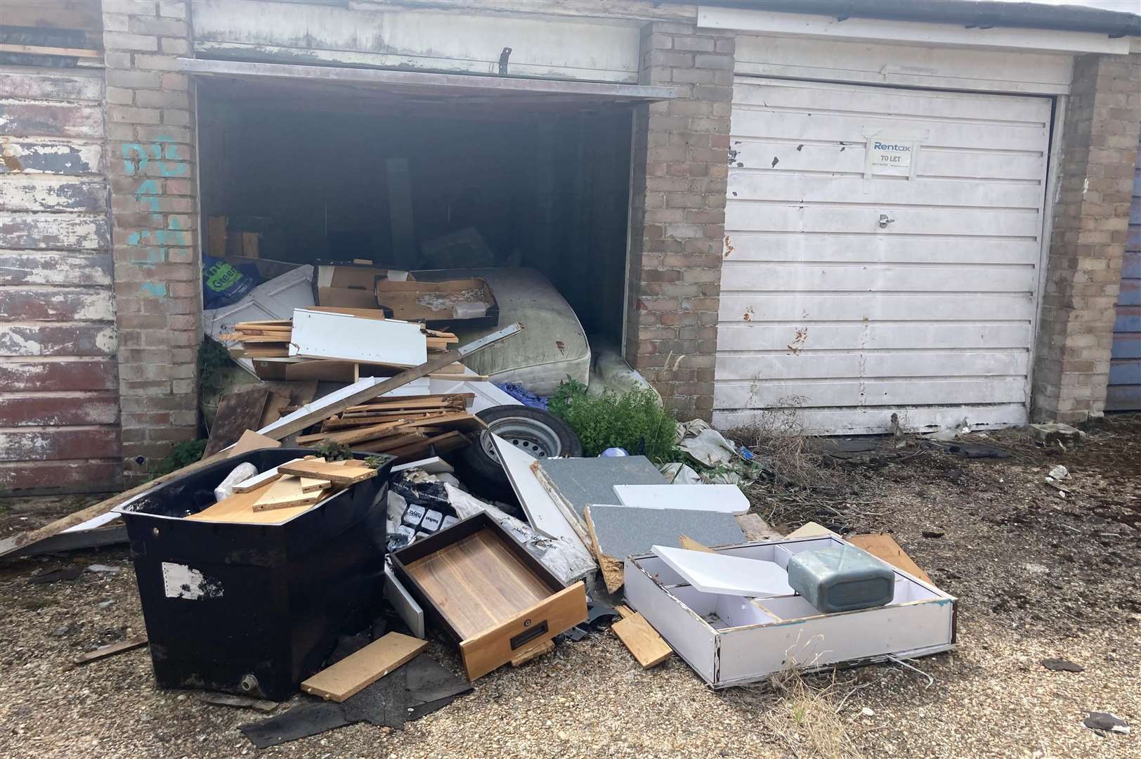 Some of the garages in Kemsing Gardens have been open and overspilling with rubbish for many years