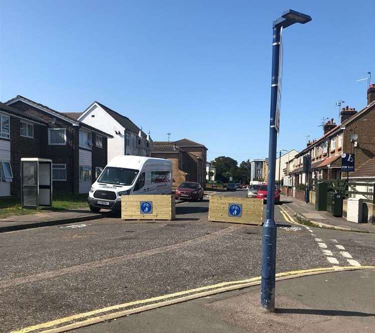 Wooden planters have been put across Russell Road, pictured here and Prospect Grove as part of the active travel trial