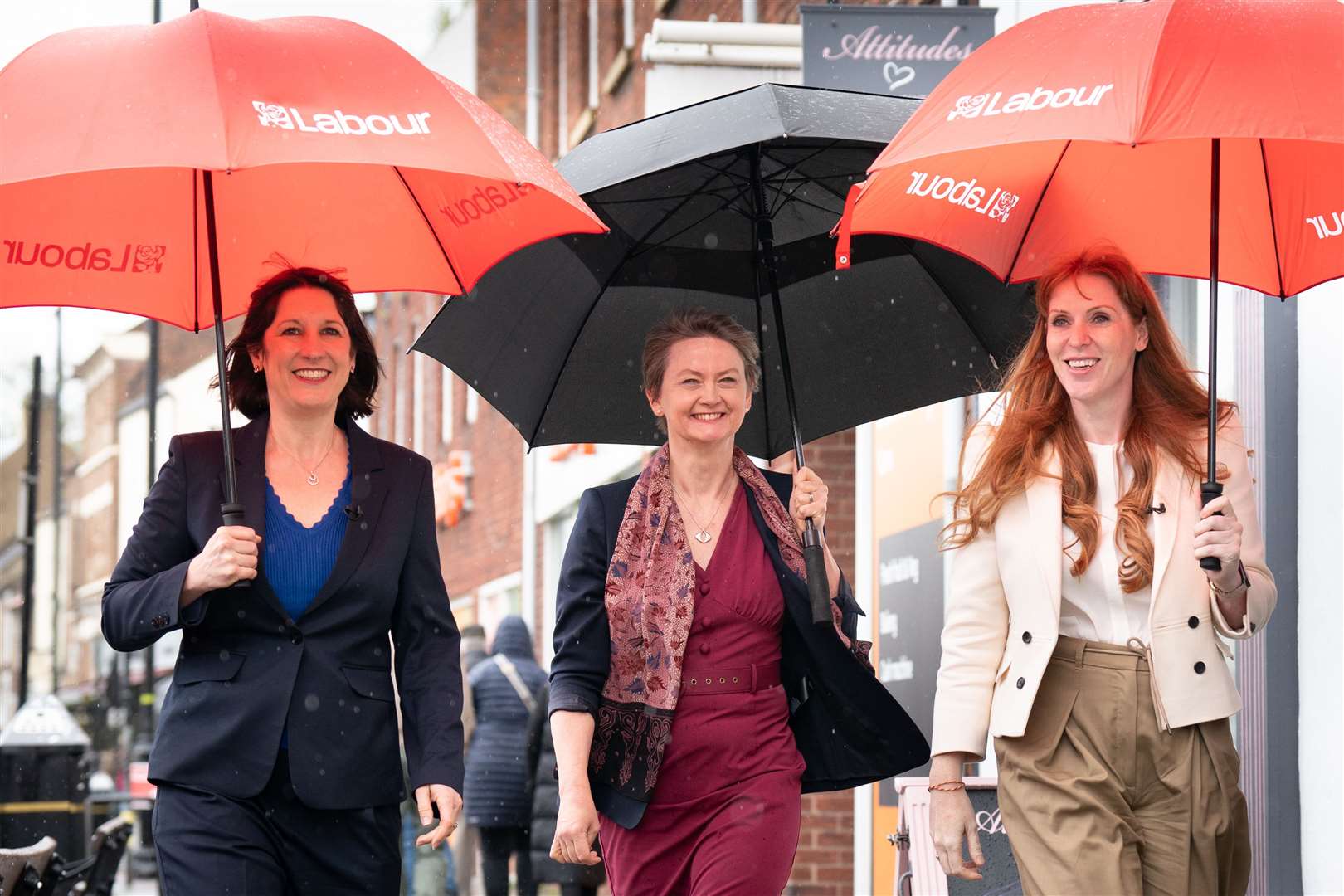 Brolly brigade Rachel Reeves, Yvette Cooper, and Angela Rayner smile despite the rain during a trip to Yarm, near Middlesbrough (Stefan Rousseau/PA)