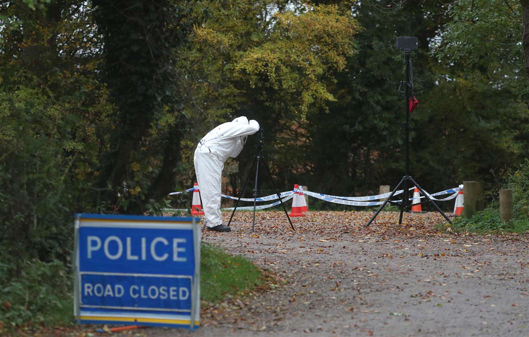 Forensic investigators at Watlington Hill in Oxfordshire after the body of a woman was discovered at the National Trust estate, a man has been arrested on suspicion of murder and is being treated for serious injuries, police said (Steve Parsons/PA)