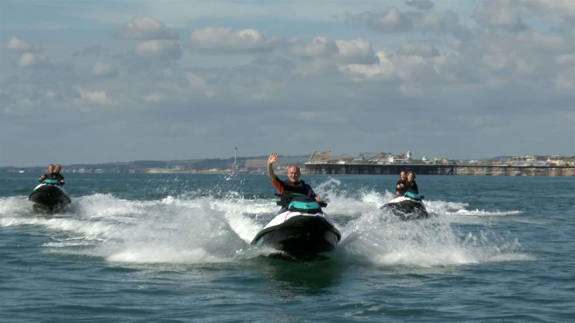 Liberal Democrat leader Sir Ed Davey jet skis into his party’s conference in Brighton on Saturday (Jamie Lashmar/PA)