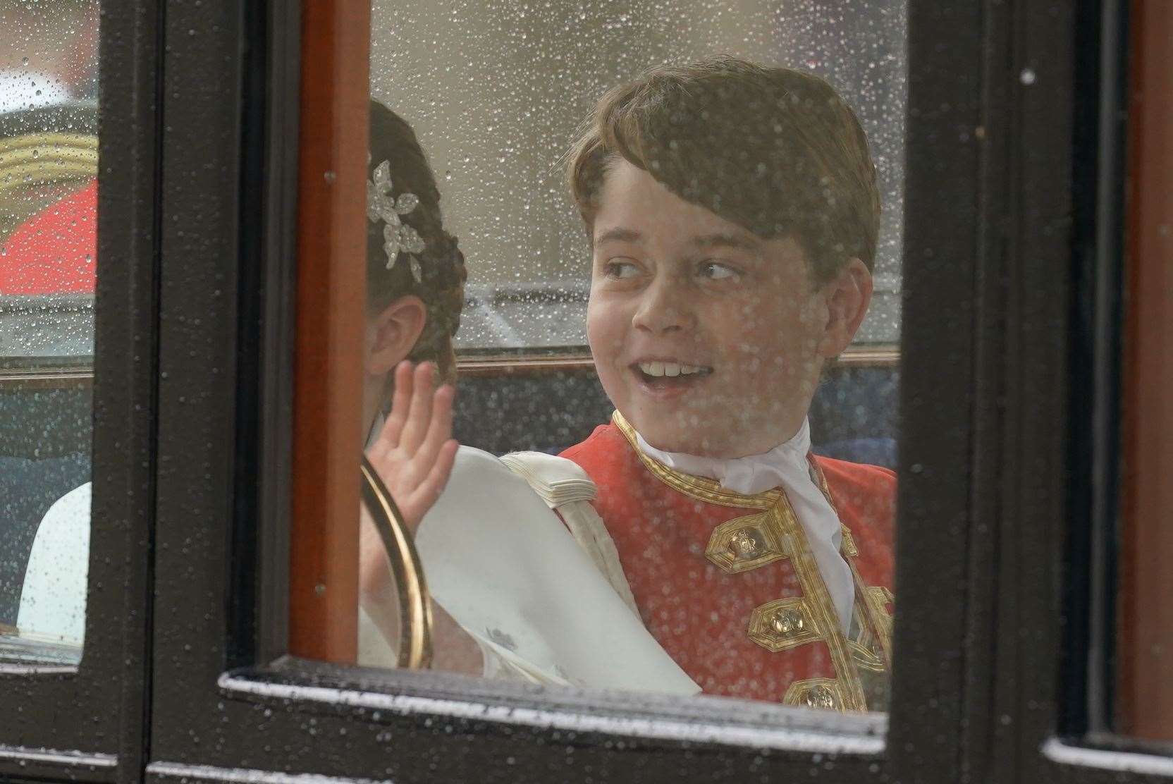 Prince George returns to Buckingham Palace by coach (Jacob King/PA)