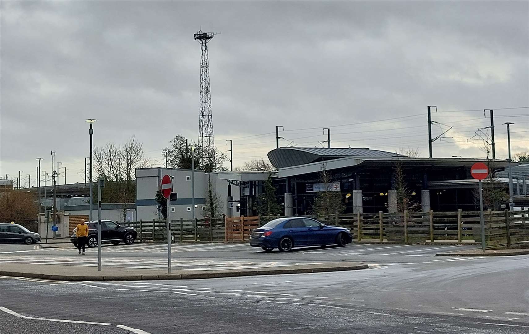 The lighting tower is next to Ashford International station