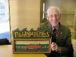 Jack Skinner from Maidstone, with a plaque of Tilling Stevens in Maidstone, which he has brought back from Australia