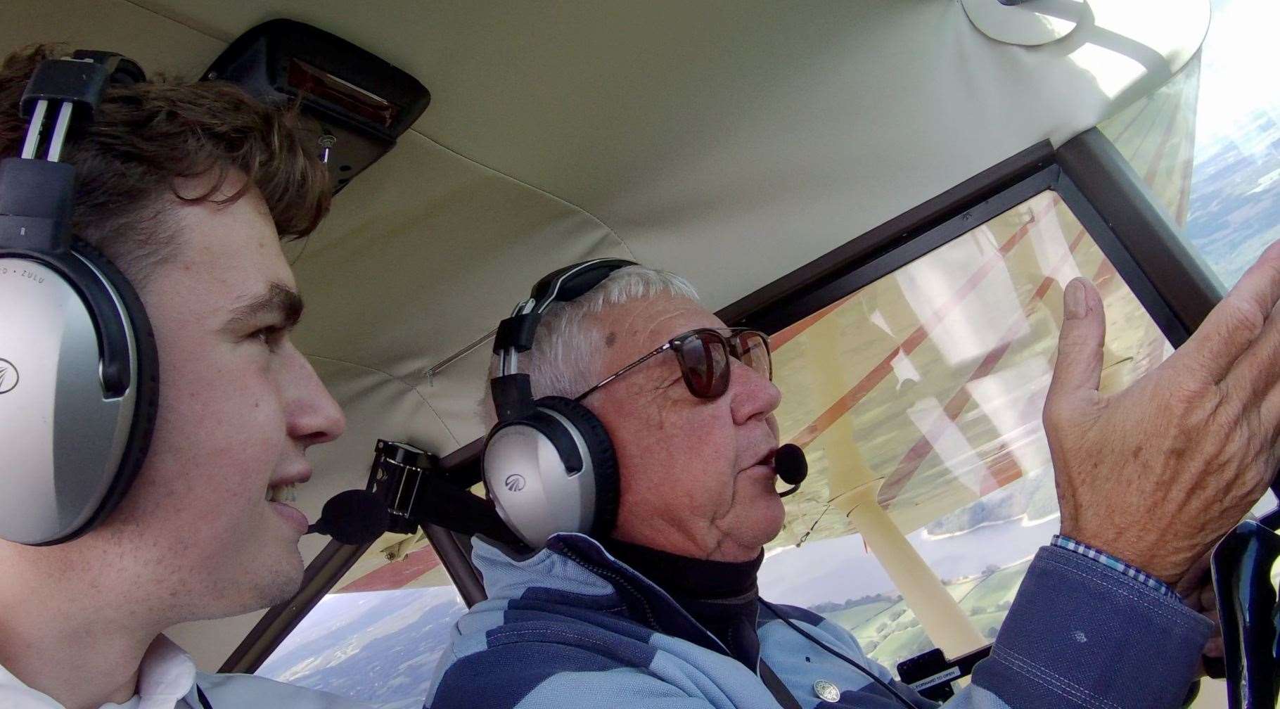 Reporter Joe Crossley listening keenly to co-pilot Jeremy Palmer